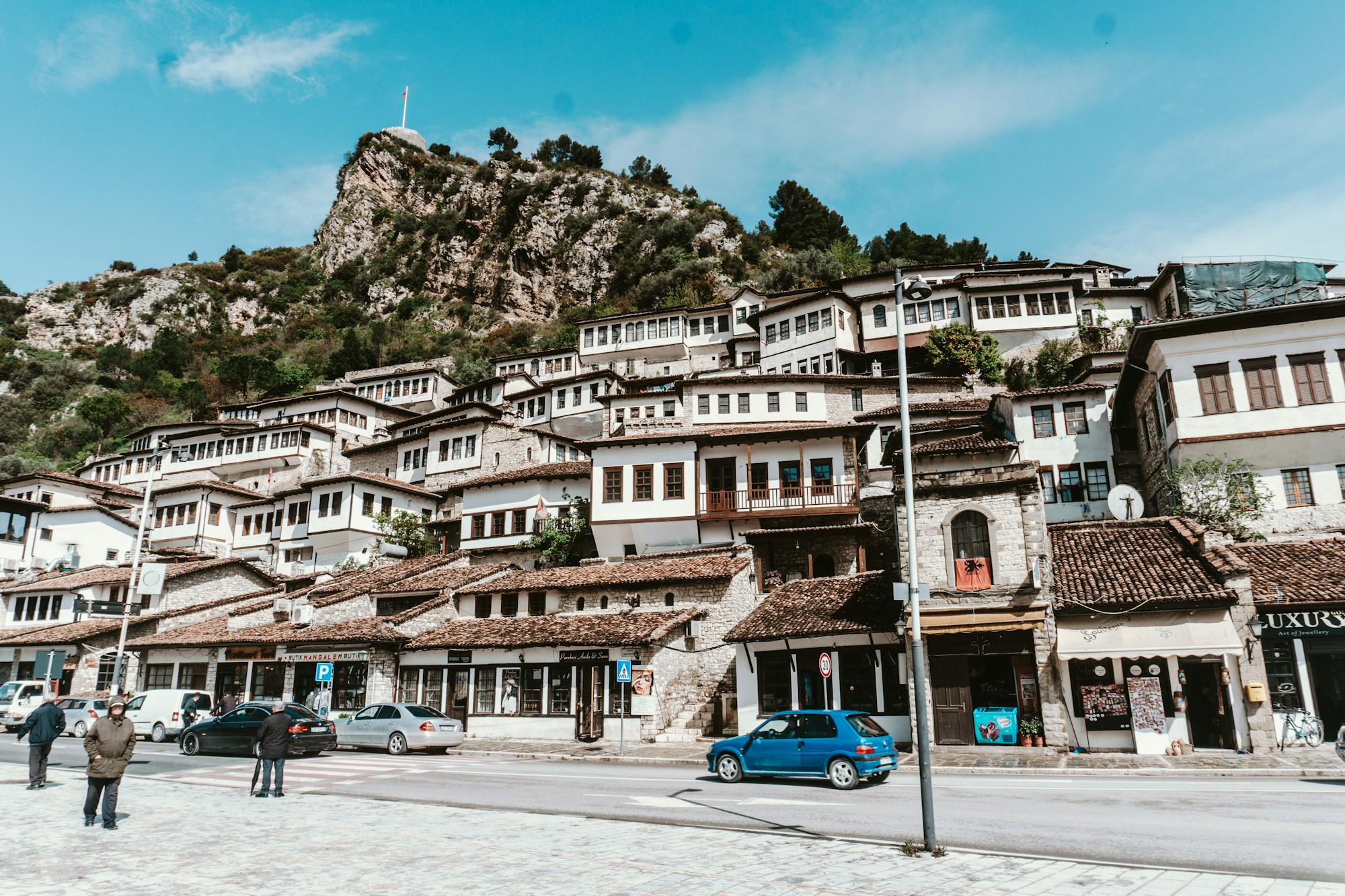 View of the old town of Berat in Albania, white Ottoman houses with countless windows clinging to the hillside