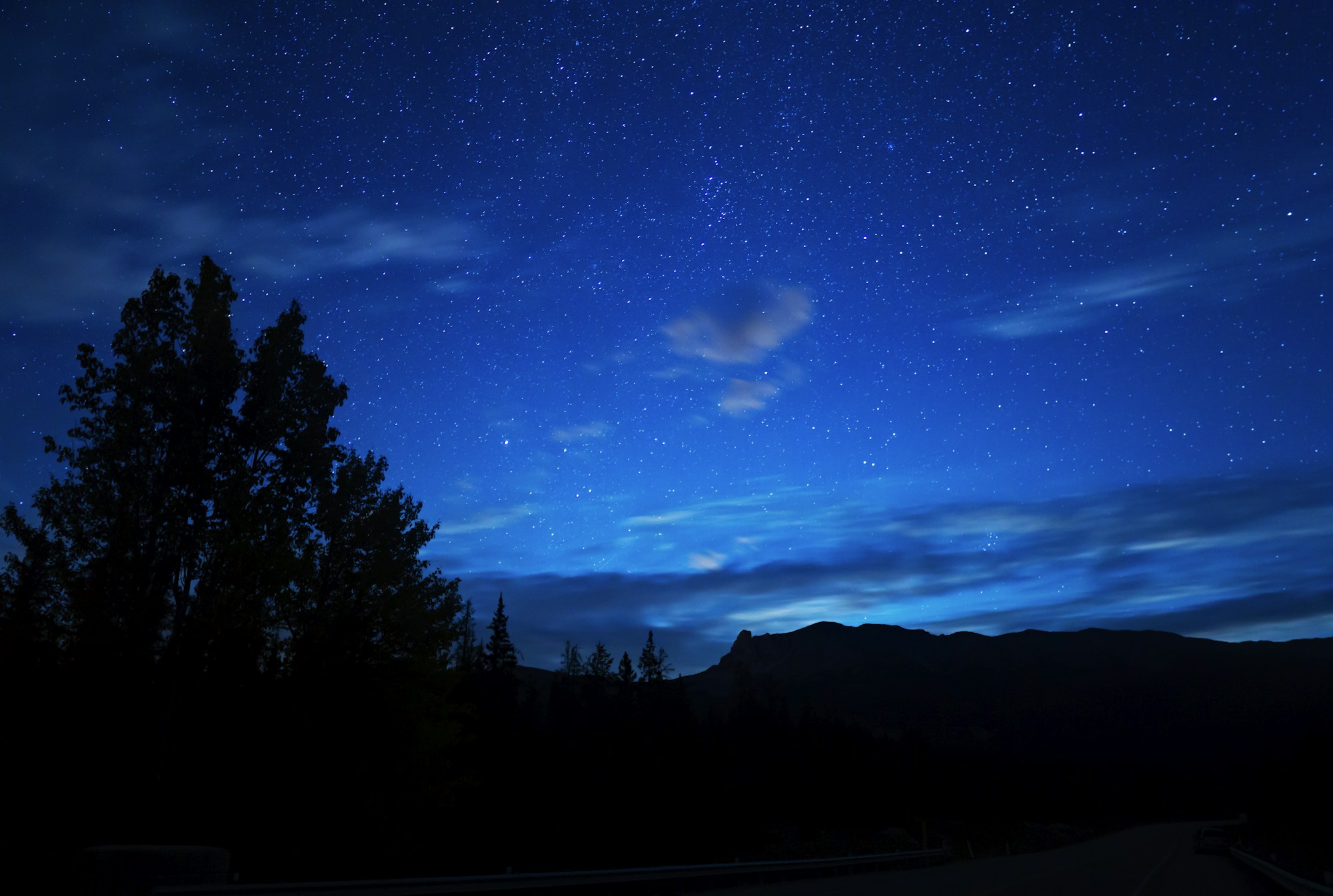 Green northern lights above Pyramid Lake in Jasper National Park, Canada