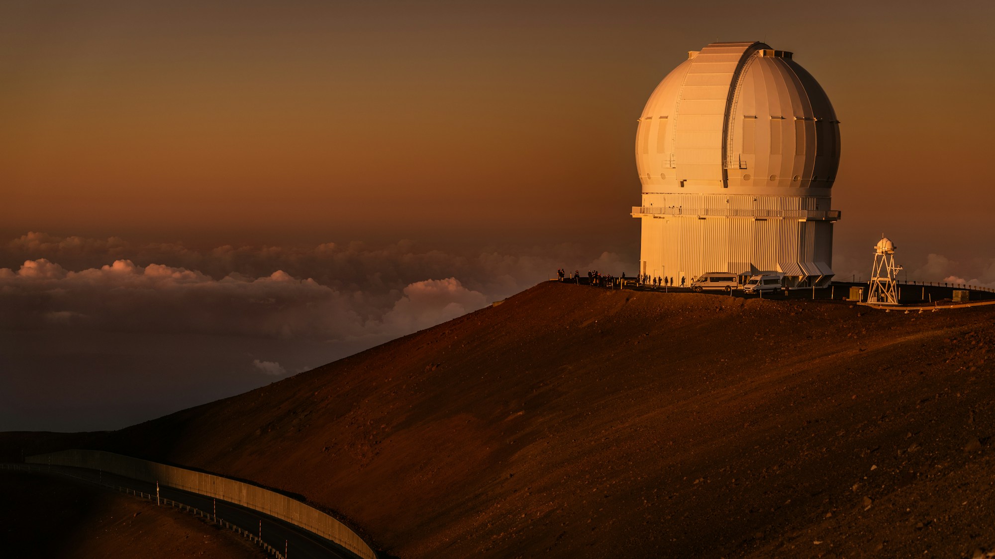 Mauna Kea observatories at twilight with the emerging Milky Way, Hawaii