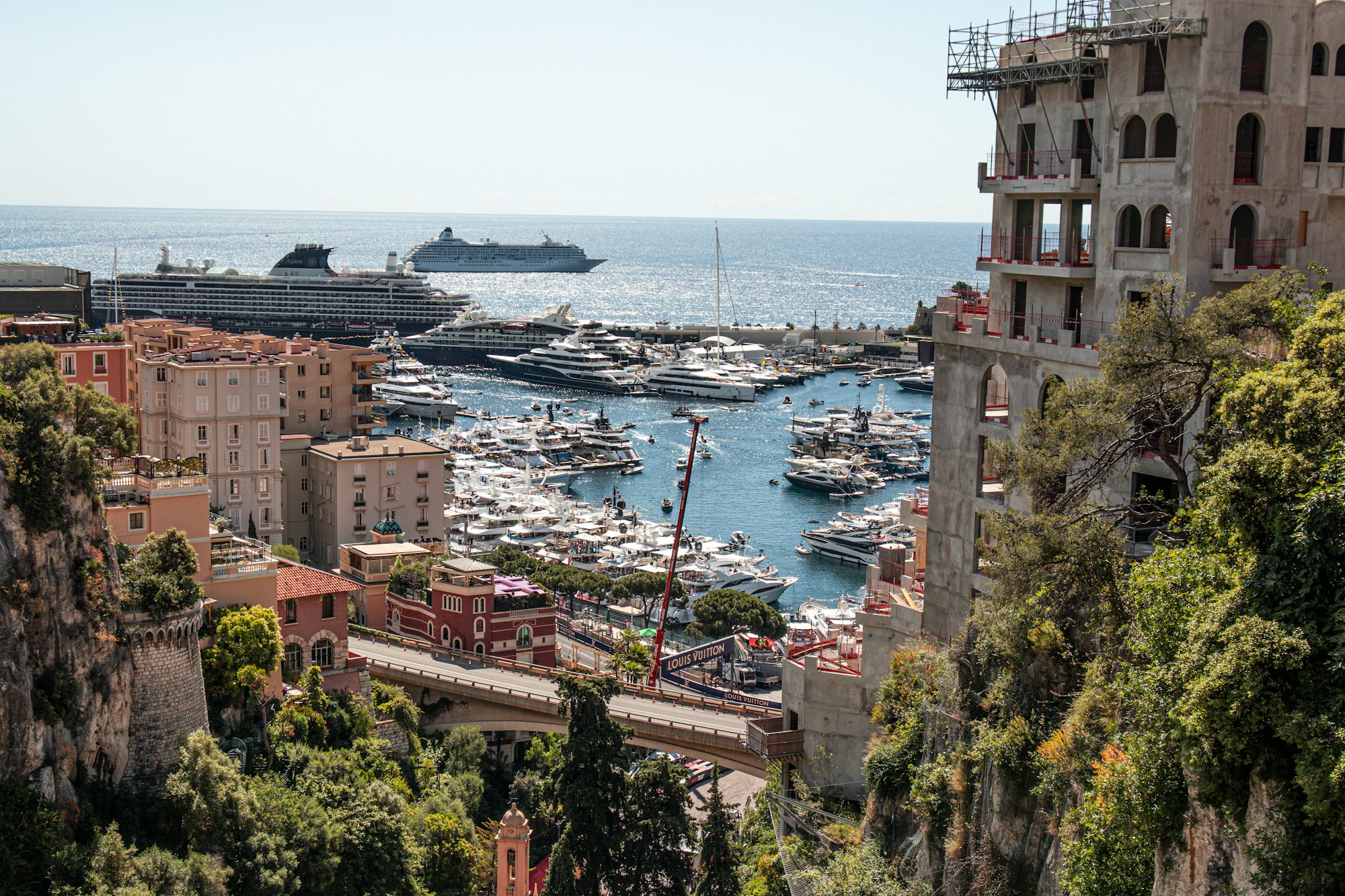 Mediterranean port with a cruise ship in the background