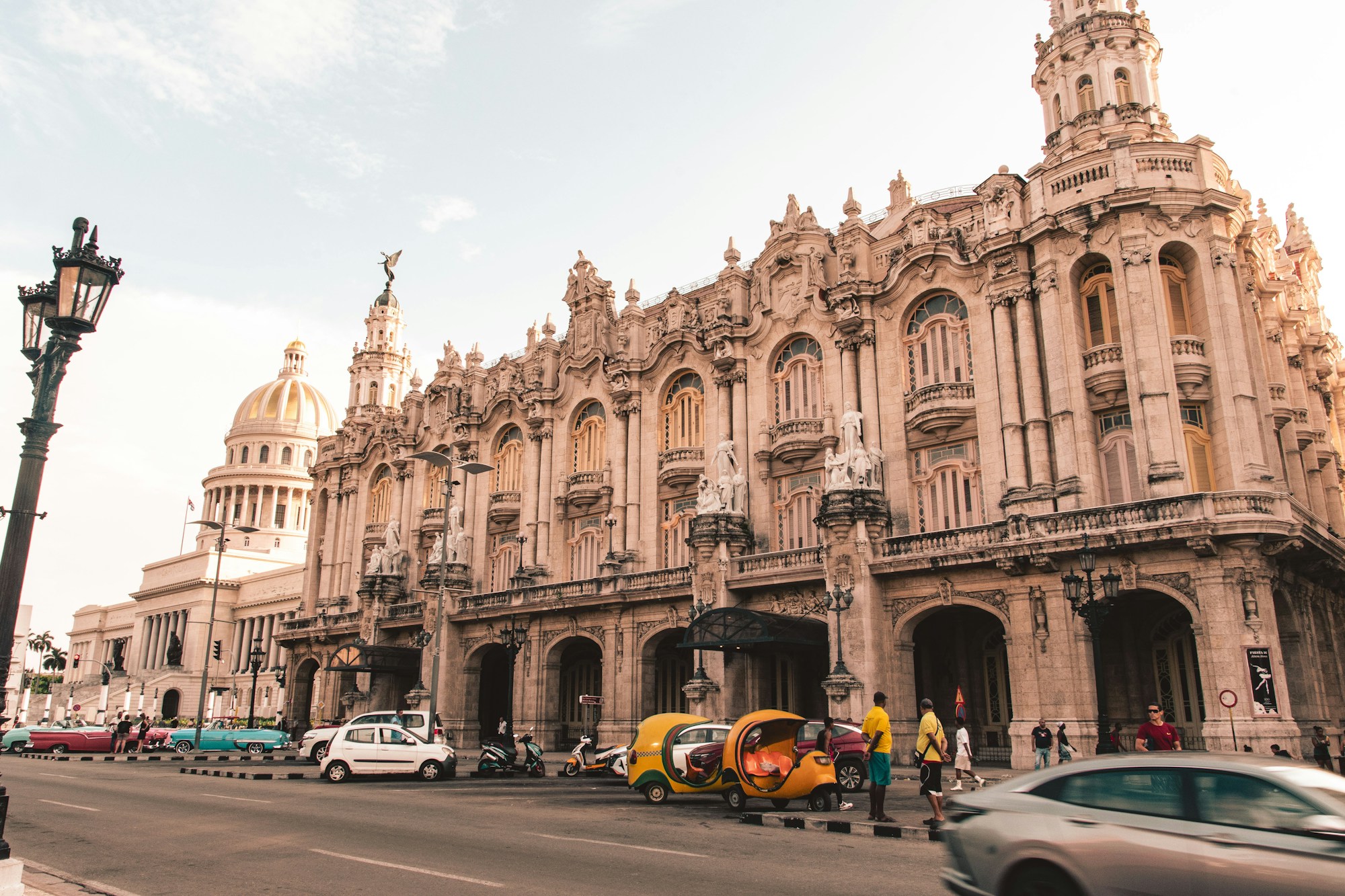 El Gran Teatro de La Habana Vieja with classic American cars in the street