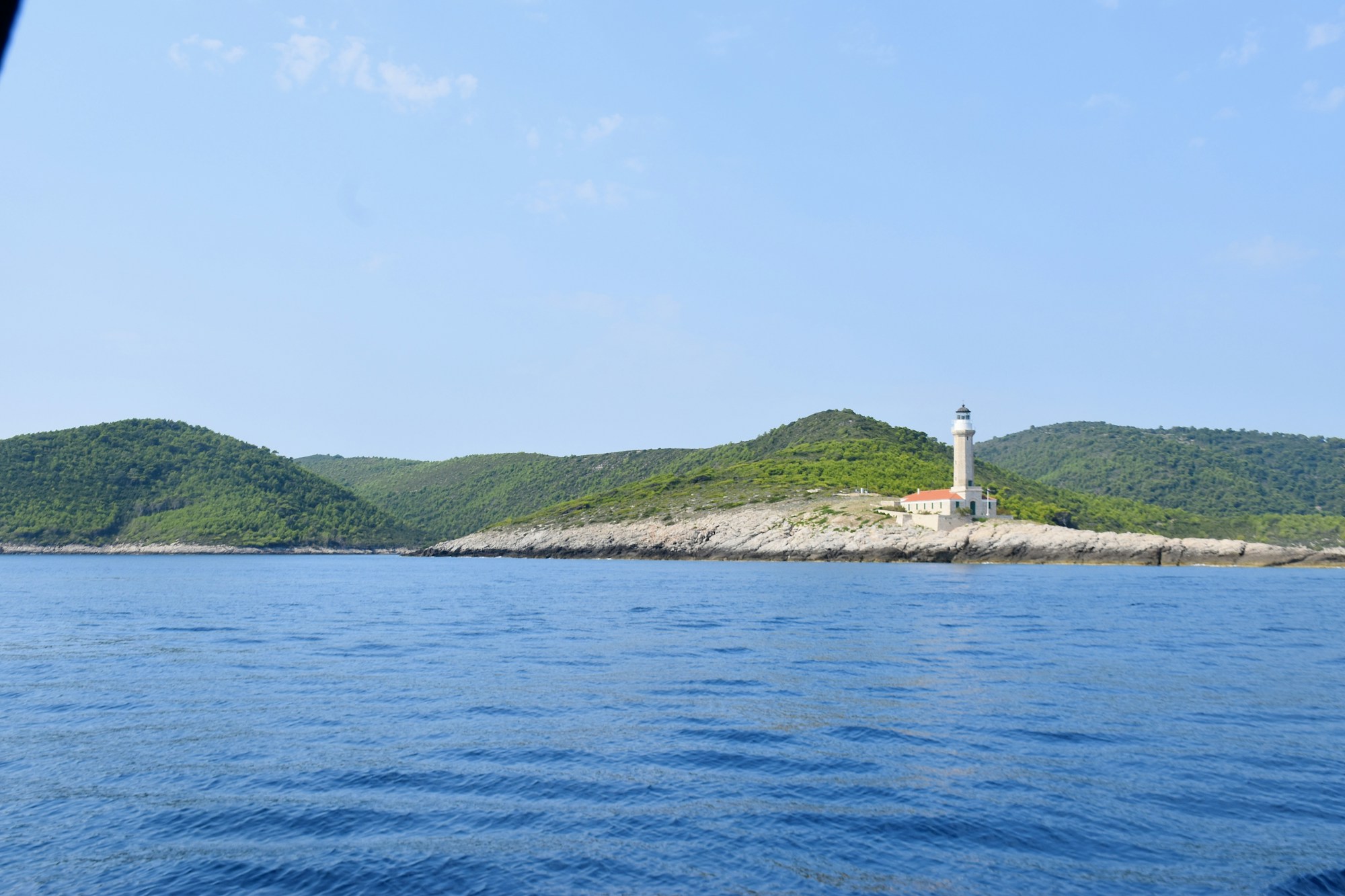 Coast and crystal-clear sea of Vis Island in Croatia