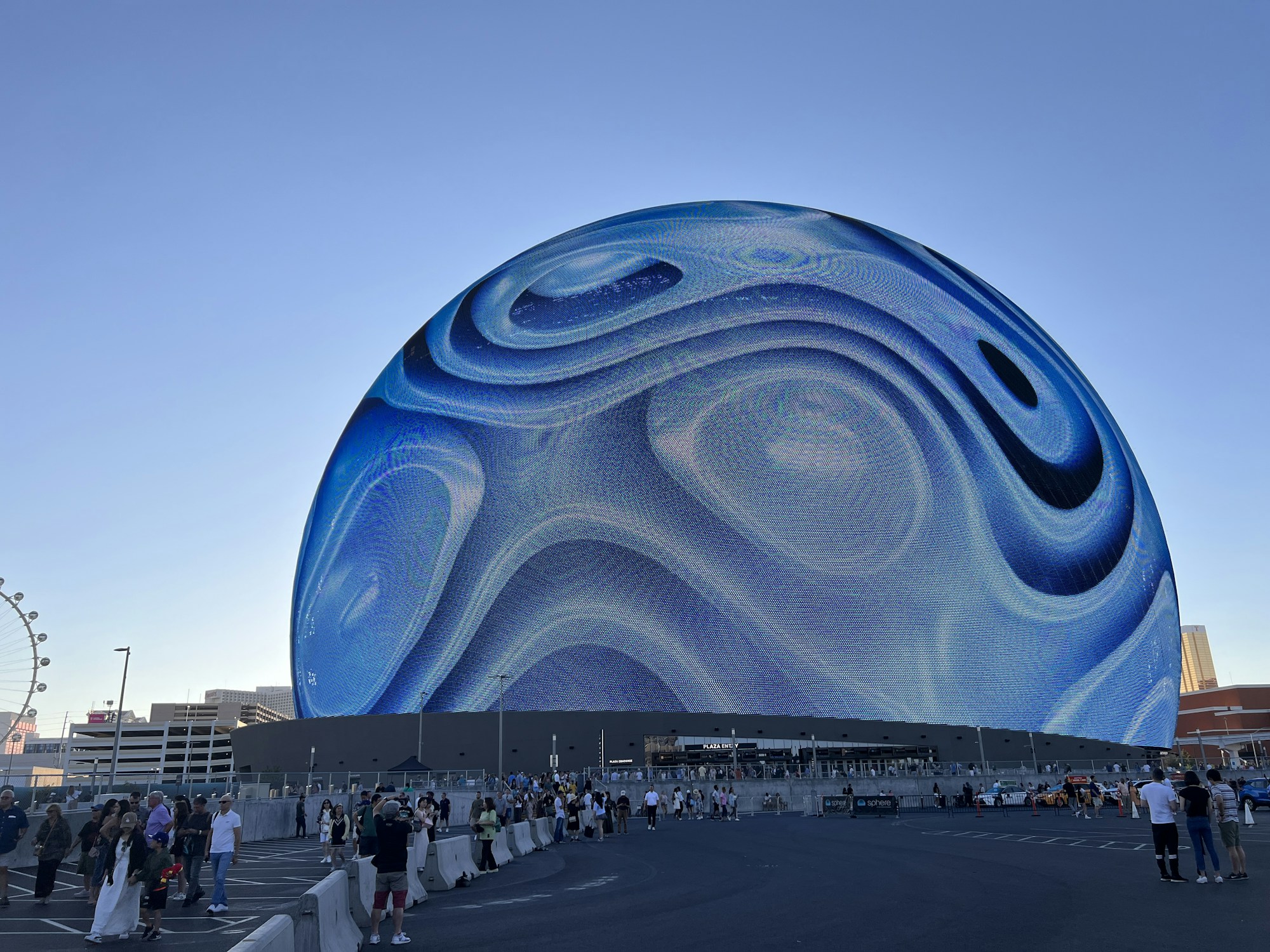 The Sphere Las Vegas, an immersive concert venue 112 metres tall with its exterior LED screen lit at night
