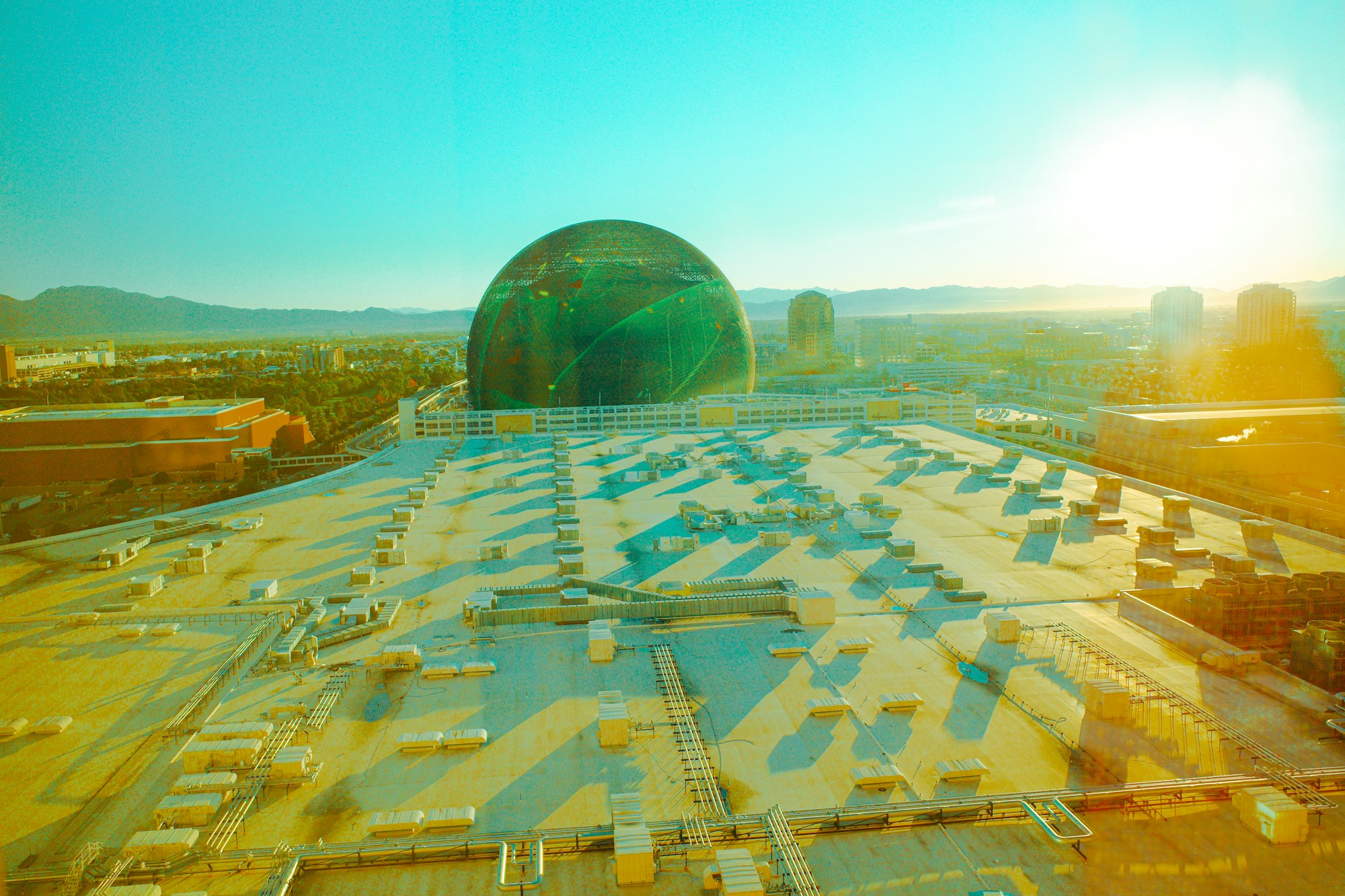 Futuristic view of the Sphere Las Vegas lit at night, giant spherical structure with its exterior LED screen