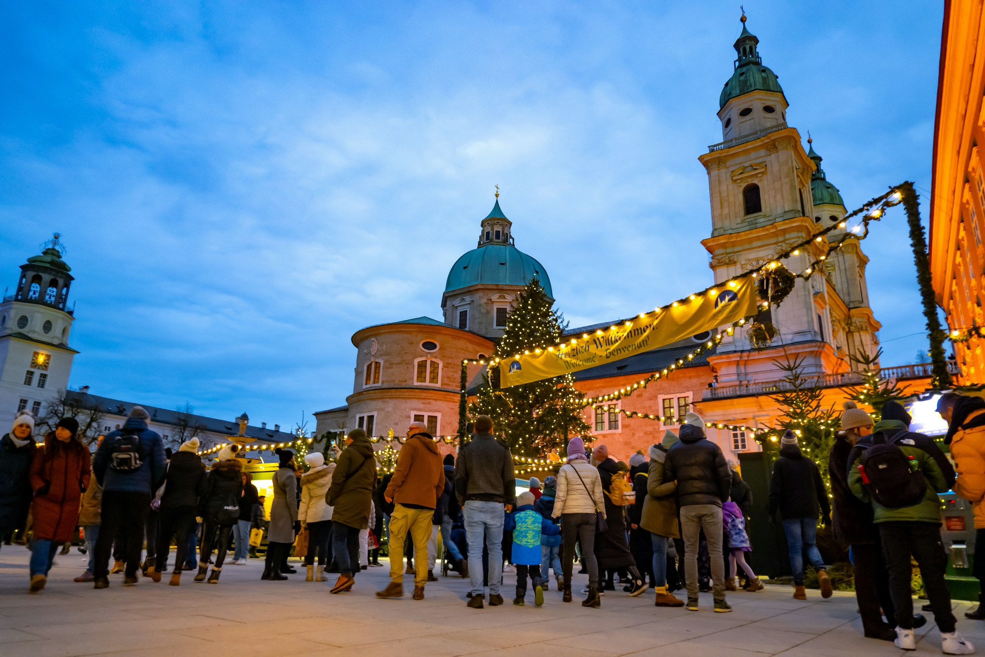 Salzburg Christkindlmarkt on Cathedral Square with Hohensalzburg Fortress in the background