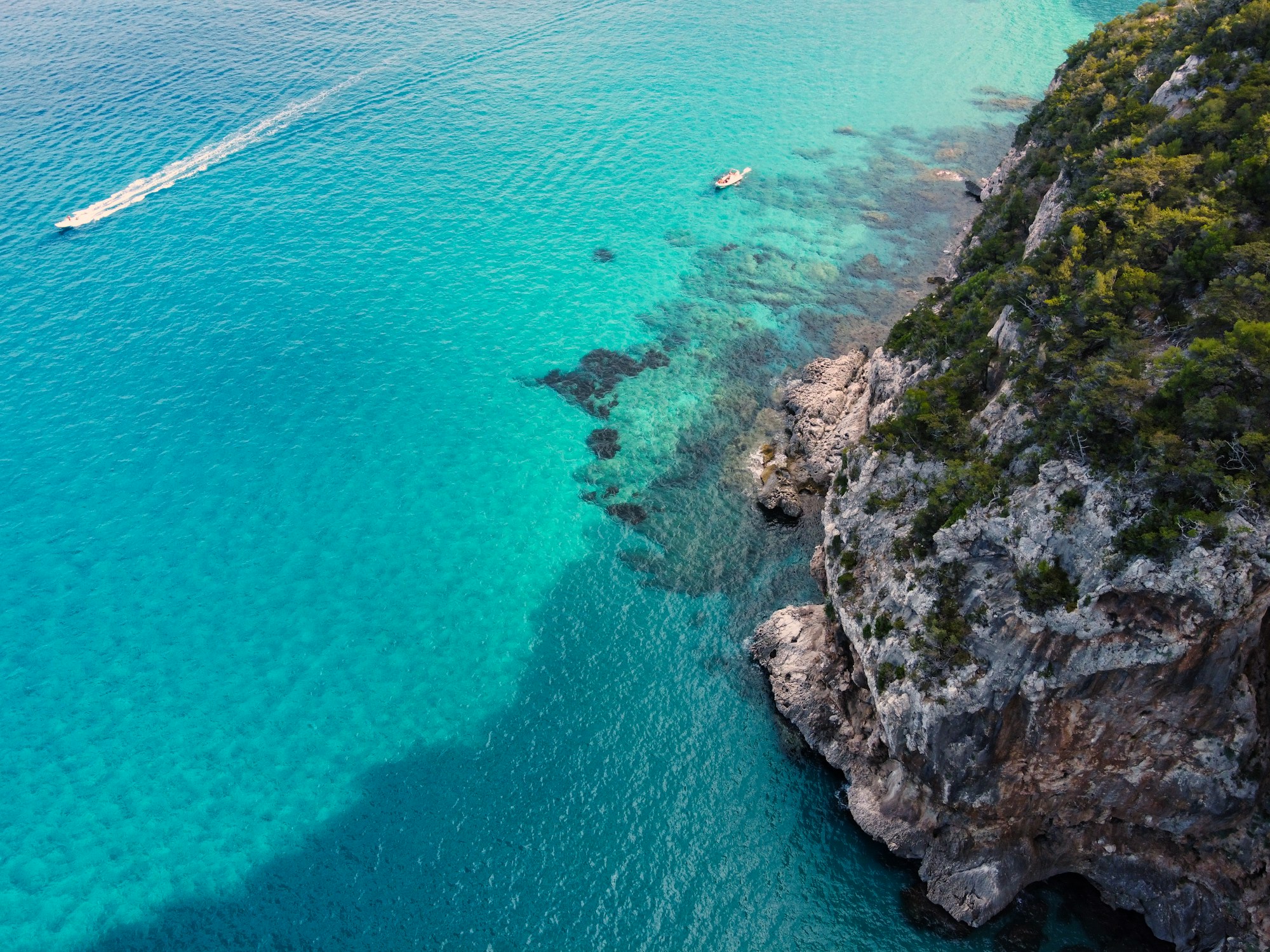 Giant golden dunes of Spiaggia di Piscinas plunging into the sea on the Costa Verde of Sardinia