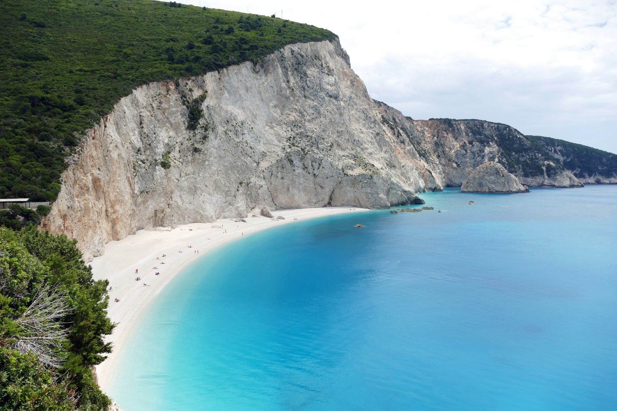 Wild and deserted cove on the northern coast of Mykonos in Greece, far from the beach clubs