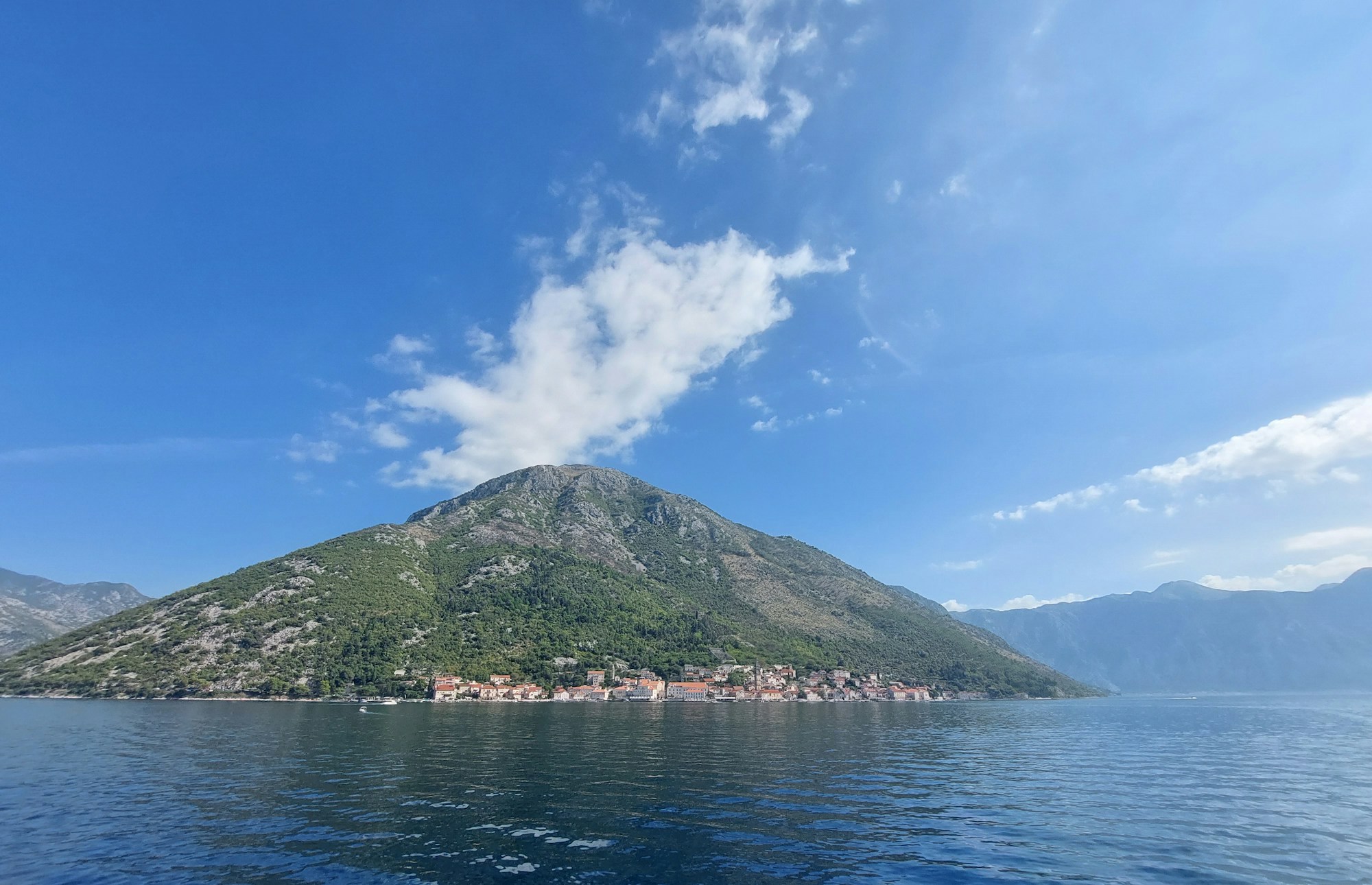 Bay of Kotor in Montenegro, Europe's only Mediterranean fjord, with mountains reflected in calm waters