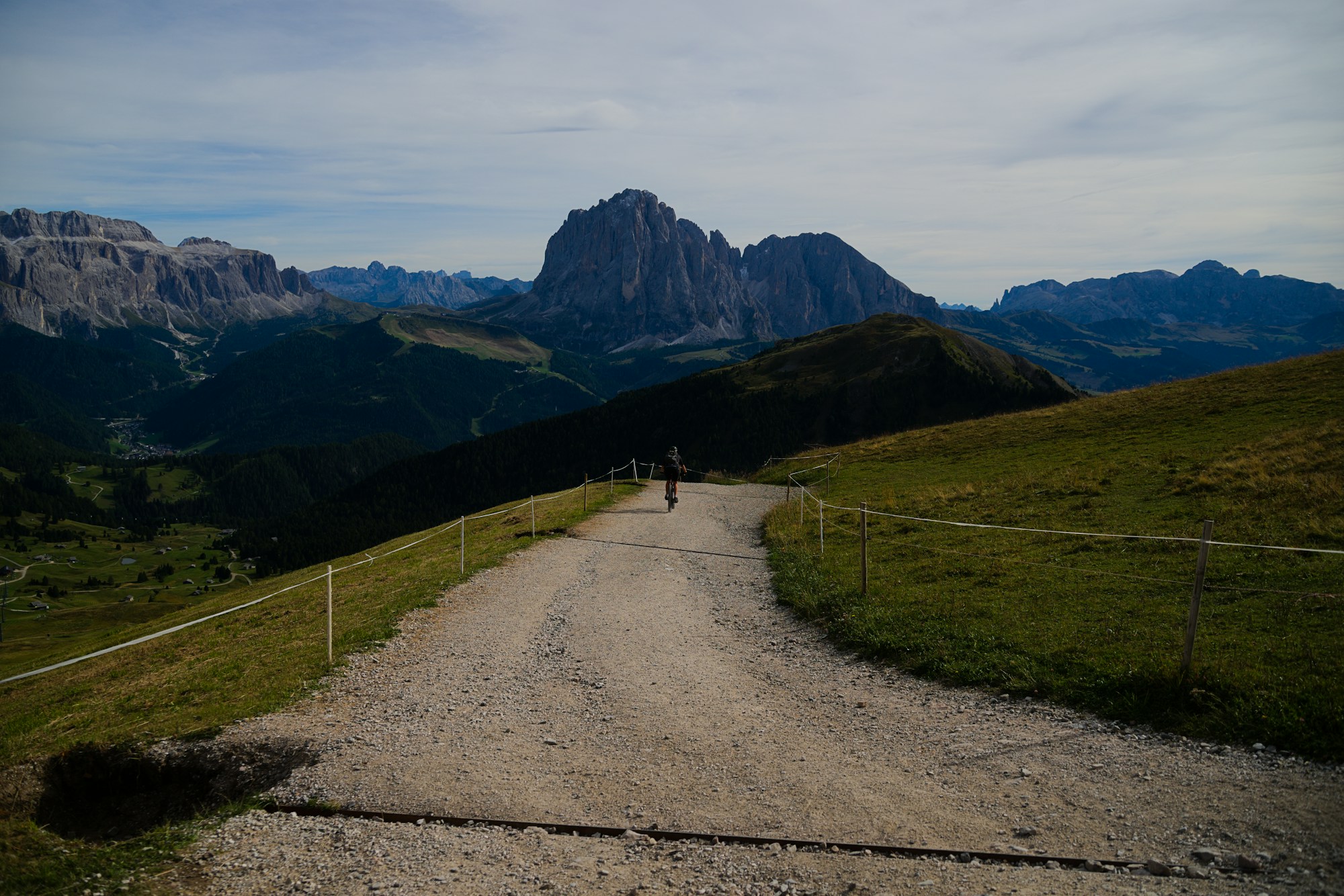 Trail running path in the Dolomites in Italy with mountain peaks
