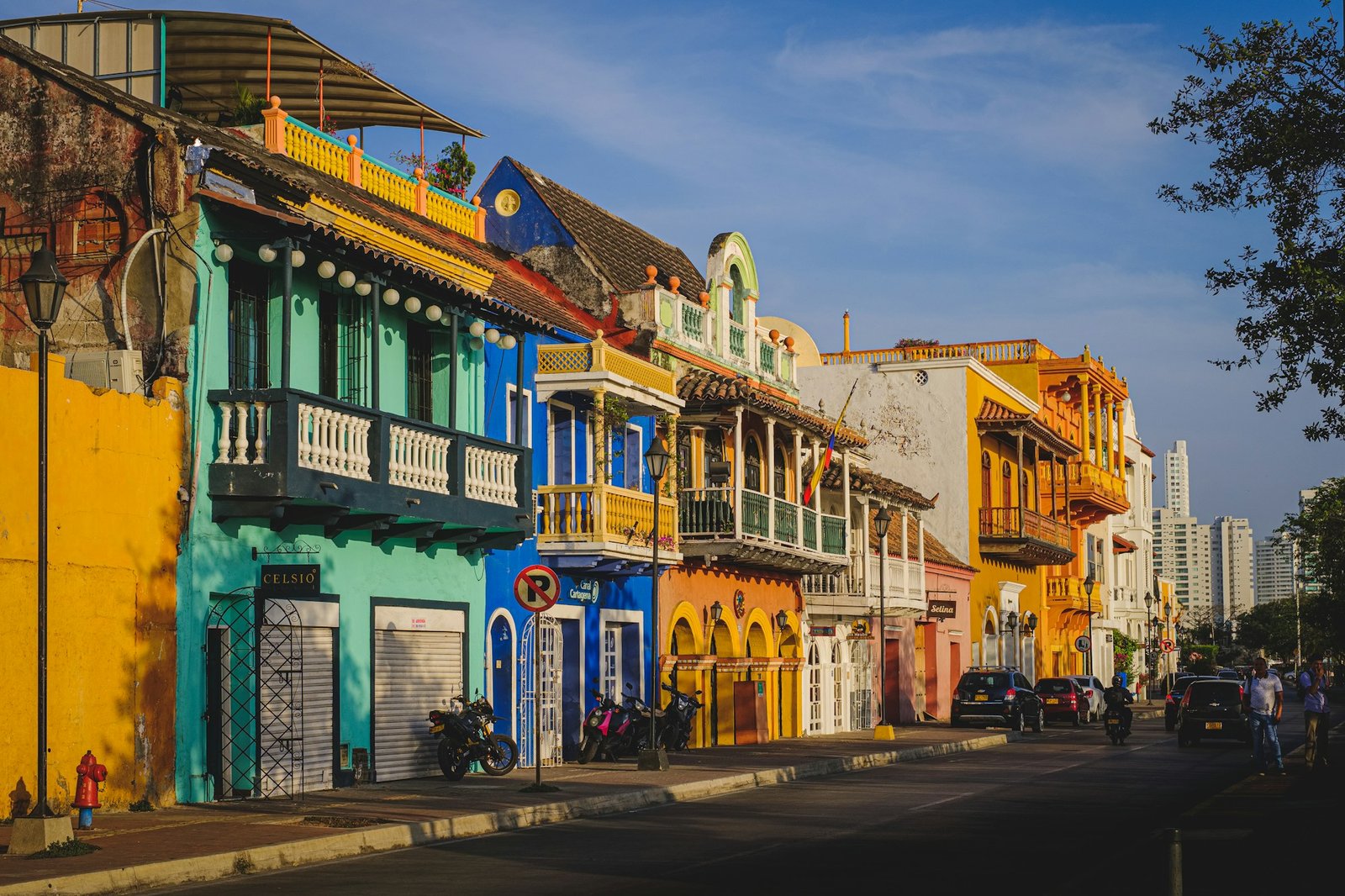 Colorful street in the Getsemaní neighborhood of Cartagena, Colombia with painted facades and Caribbean atmosphere