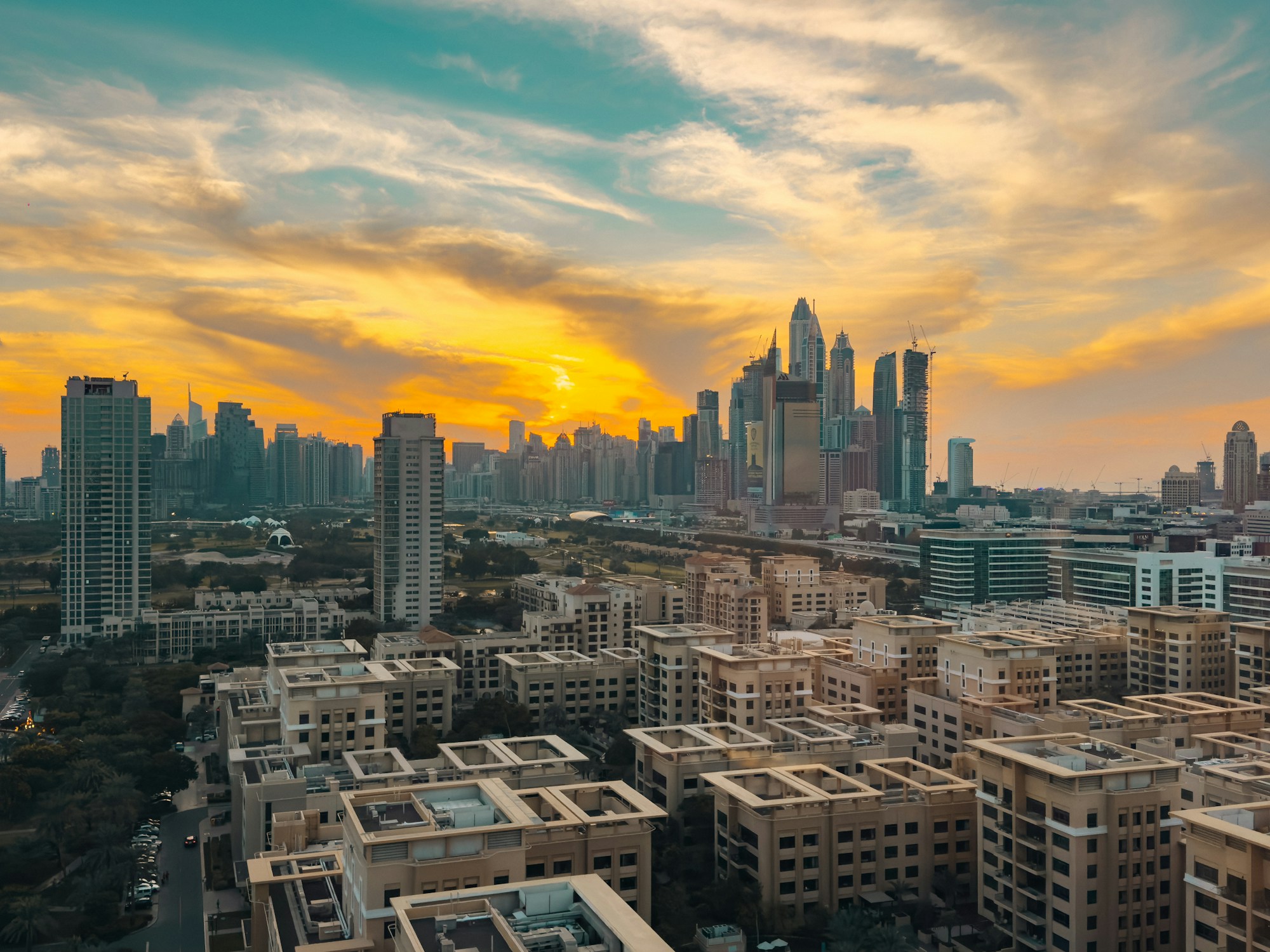 Dubai skyline at sunset with the Burj Khalifa, a luxury tax-free destination for digital nomads