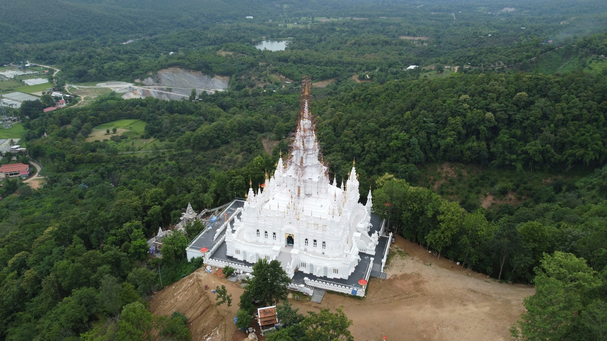 Aerial view of white Buddhist temple in Chiang Mai, Thailand, iconic digital nomad destination