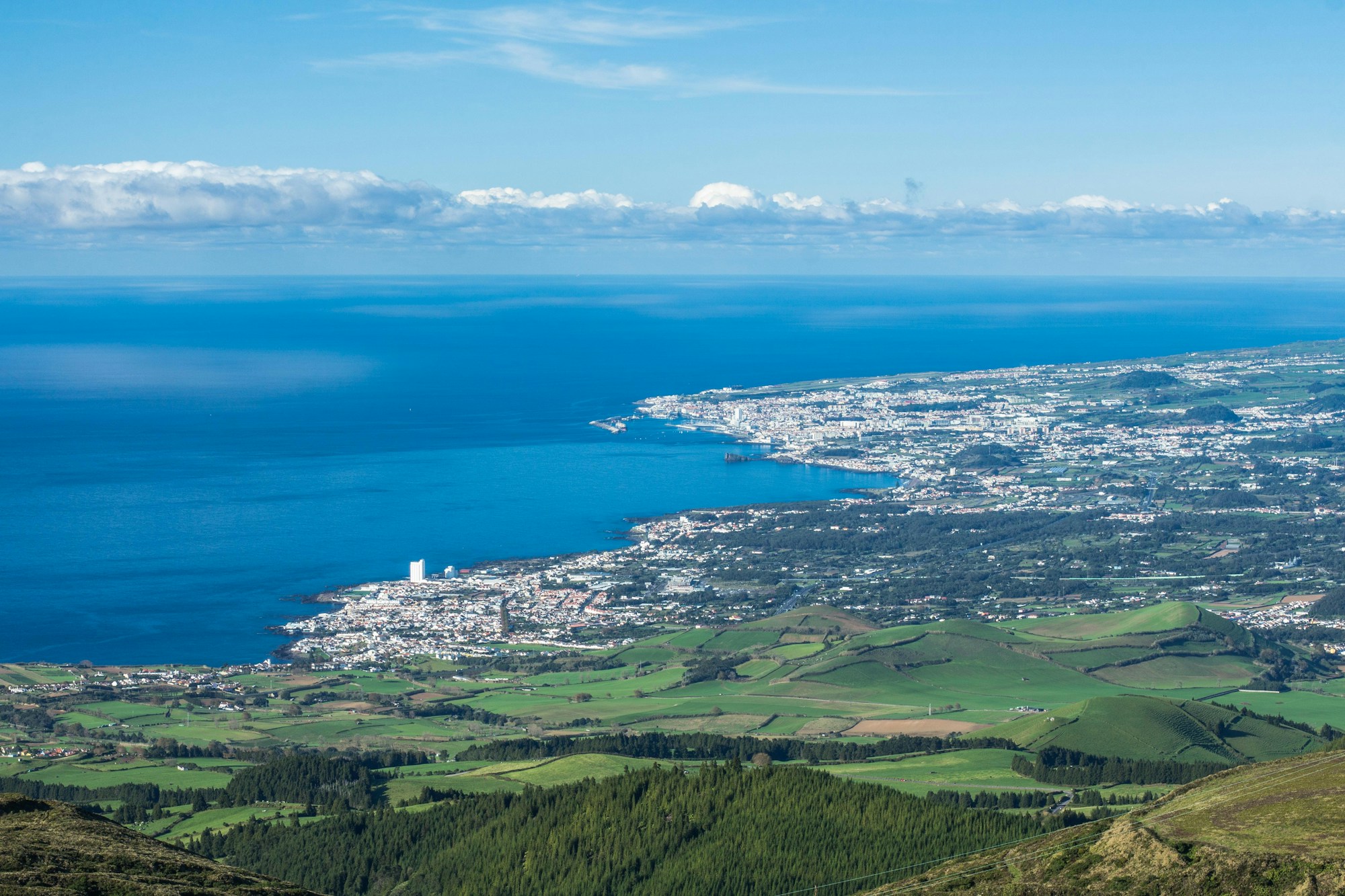 Volcanic lake in the Azores surrounded by lush vegetation, a wheelchair-accessible archipelago
