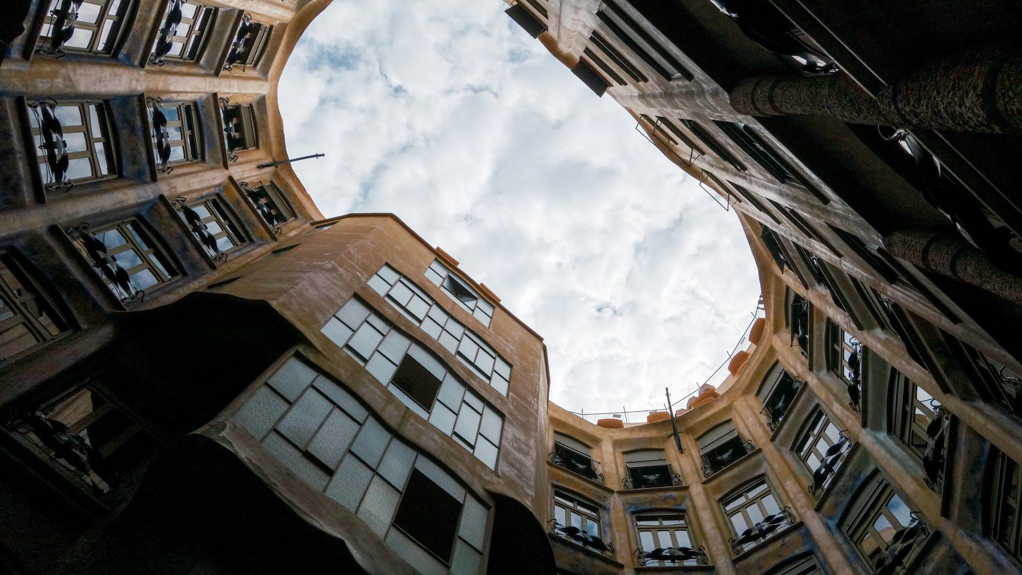 Looking down into the inner courtyard of Gaudí's Casa Milà (La Pedrera) in Barcelona