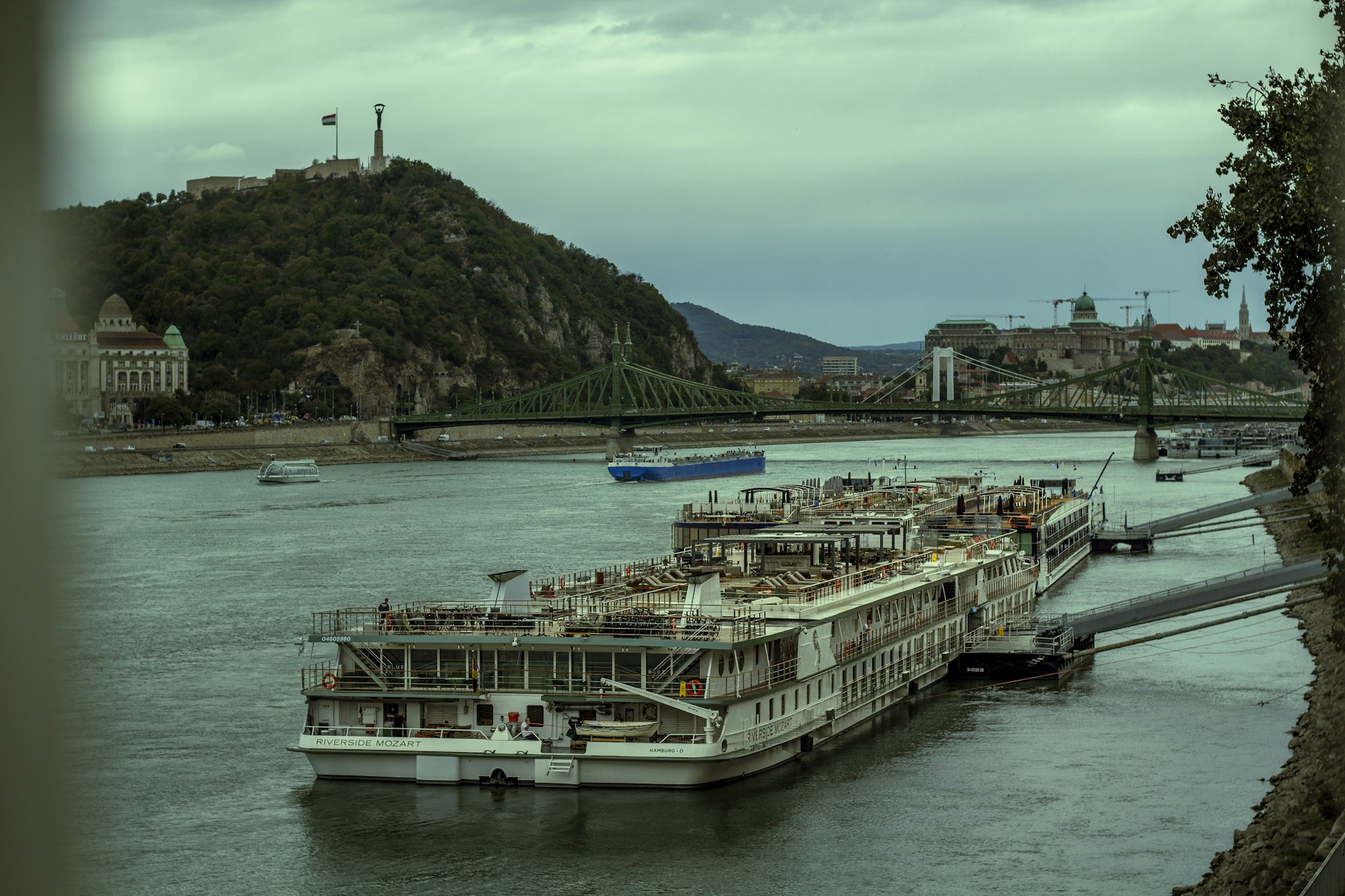 Modern river cruise ship moored on a European river