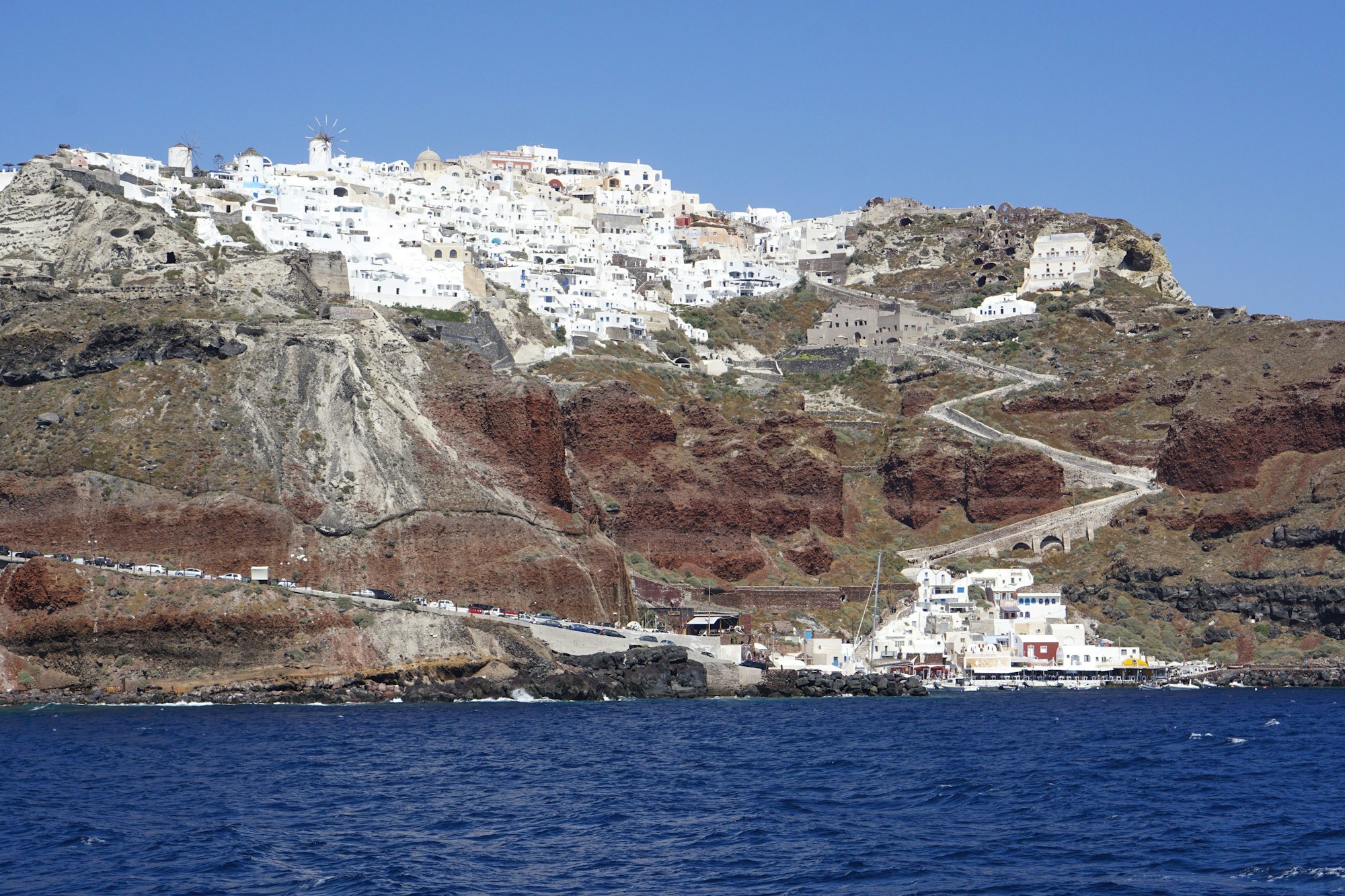 View of Santorini island from a boat in the Aegean Sea