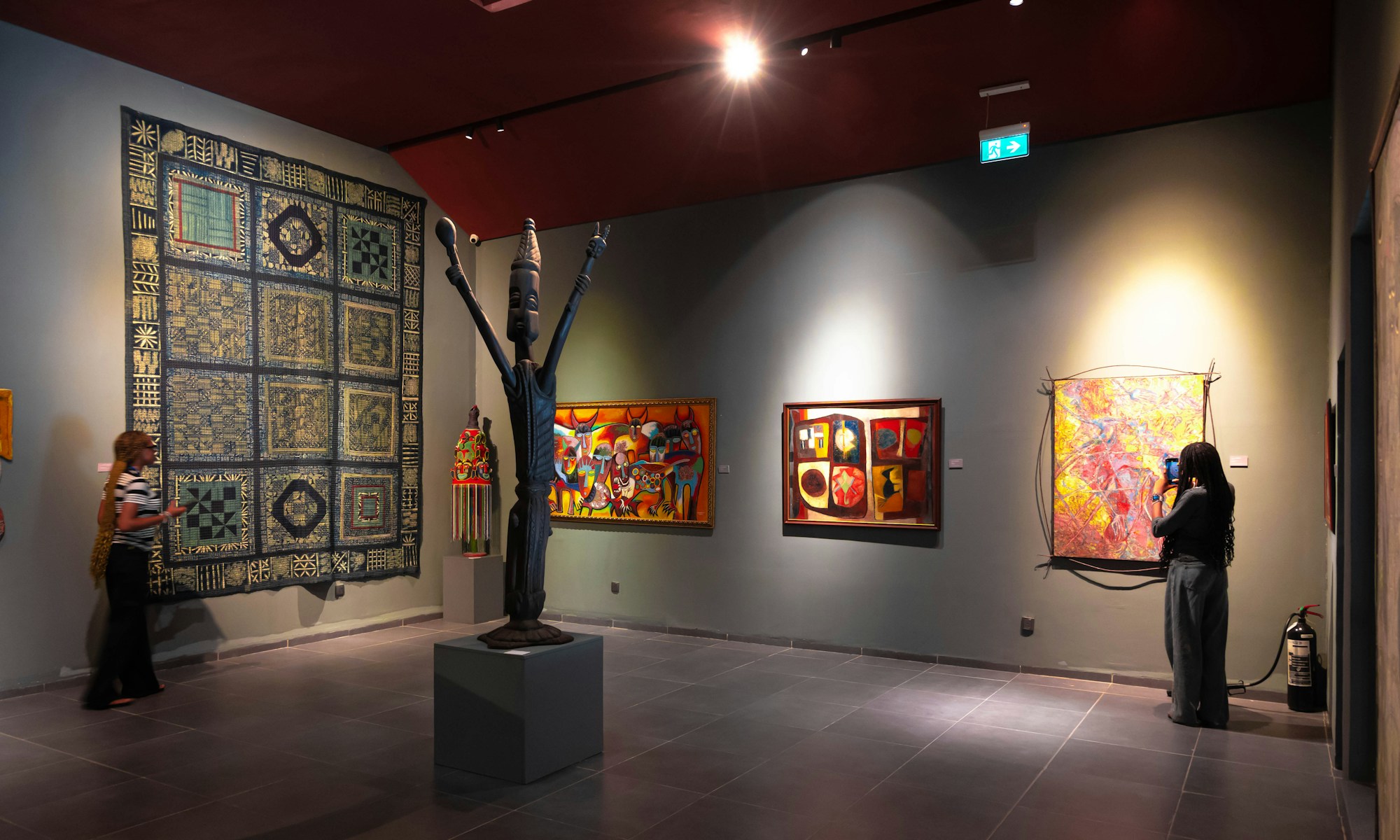 Visitors in a contemporary art gallery at a photography exhibition