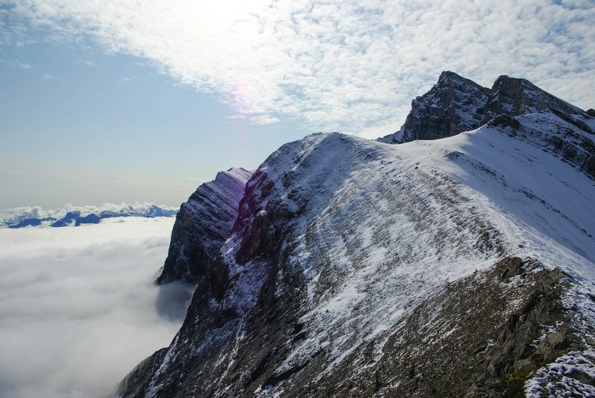 Ha Ling Peak in Kananaskis Country, Alberta, Canada, surrounded by snow and pine trees