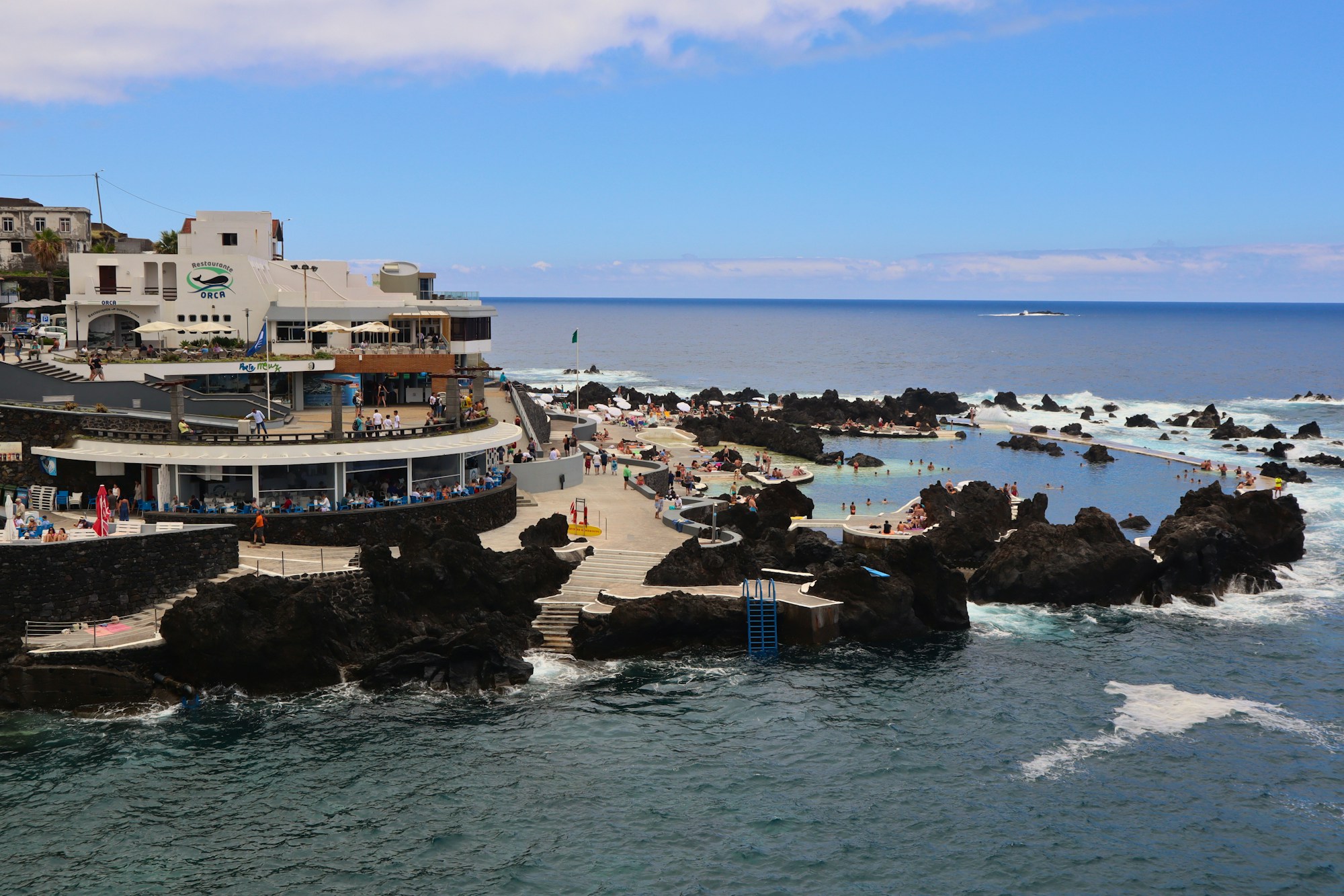 Volcanic natural pools of Porto Moniz in Madeira with a view over the Atlantic Ocean