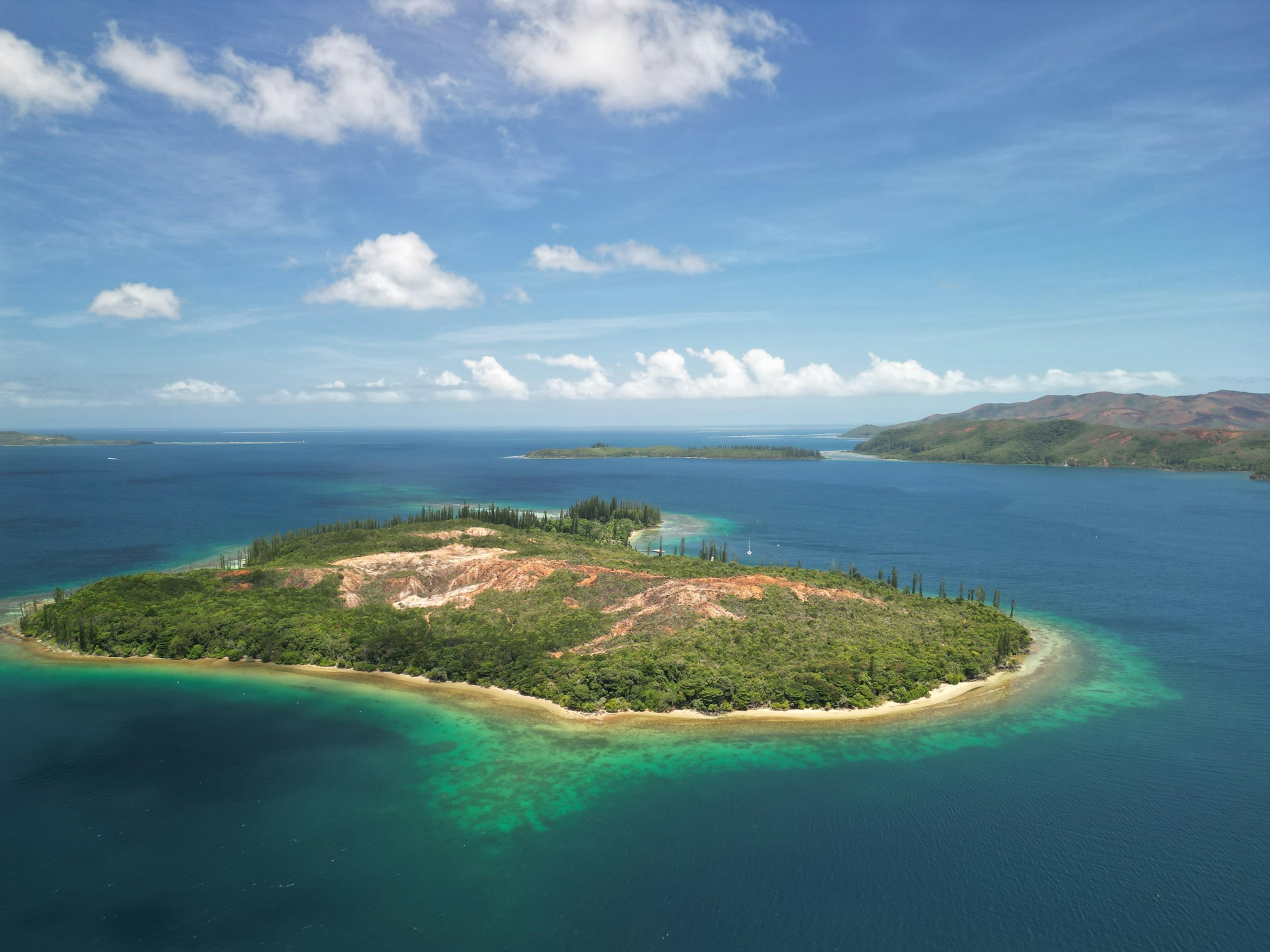 Casy Islet in New Caledonia, preserved coastal landscape with endemic tropical vegetation