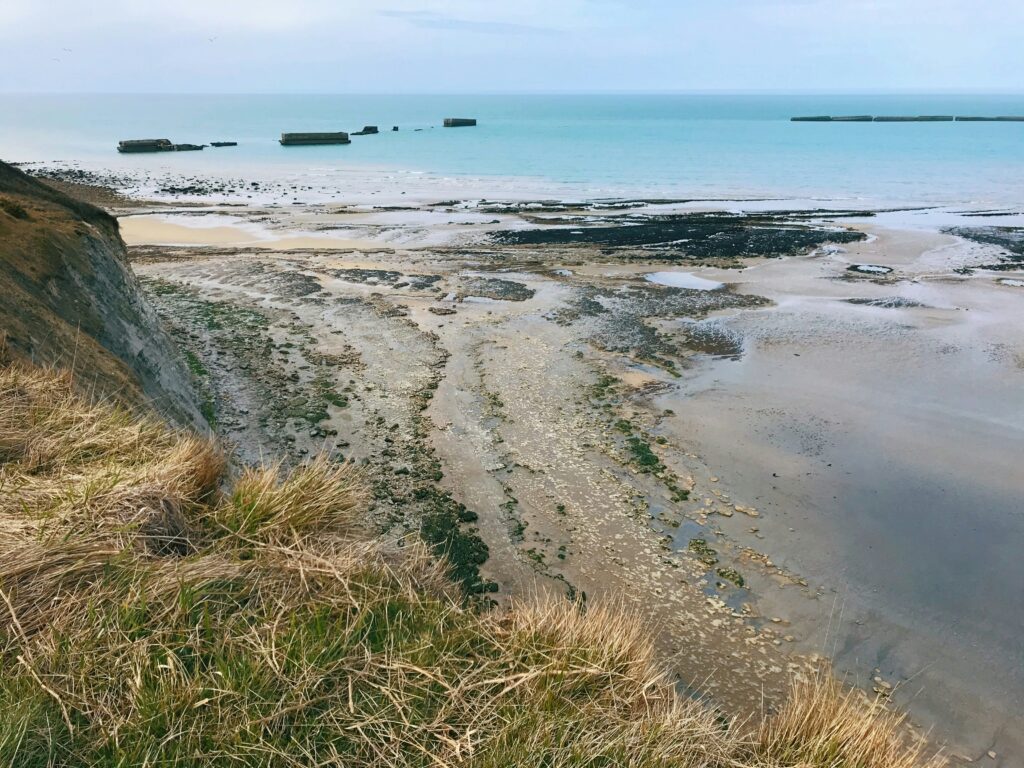 Normandy beach at low tide — UNESCO 2026 candidacy for the D-Day Landing Beaches
