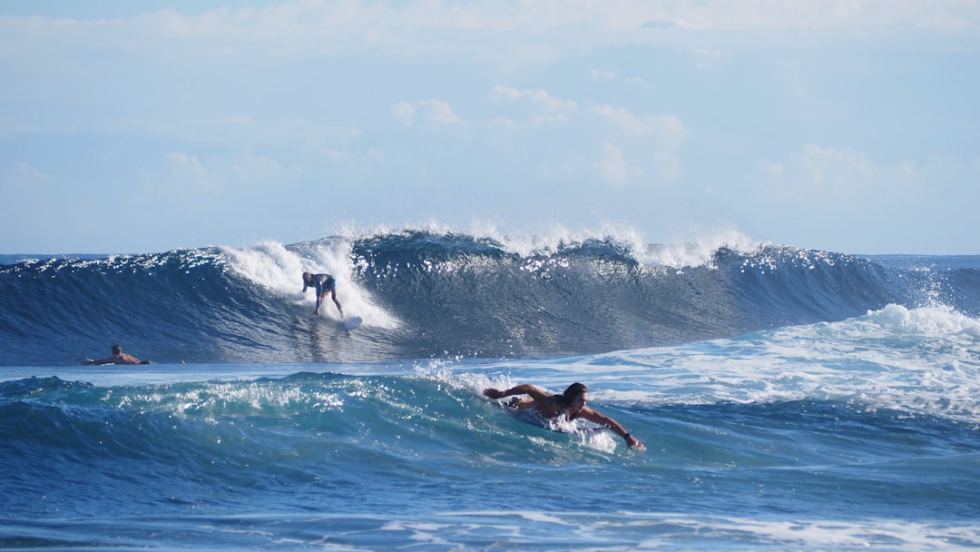 Caribbean beach in Puerto Rico with waves under the sun, perfect for your stay during Miss Universe 2026
