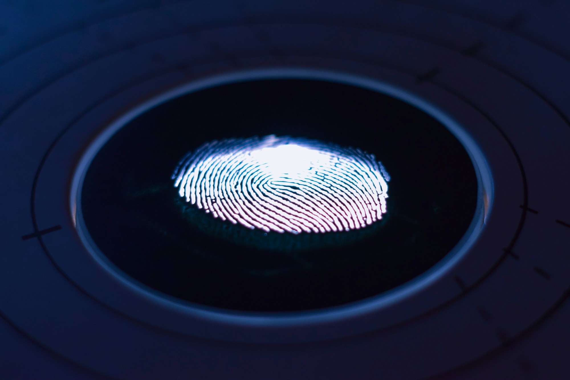 Biometric fingerprint and facial recognition scanner in a modern airport