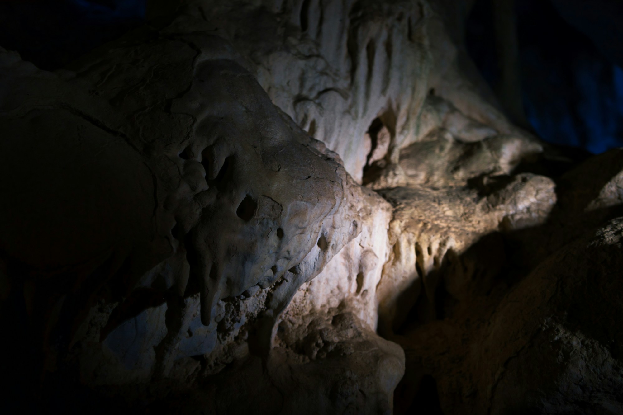 Spectacular limestone formations in an underground cave — illuminated stalactites in Slovenia