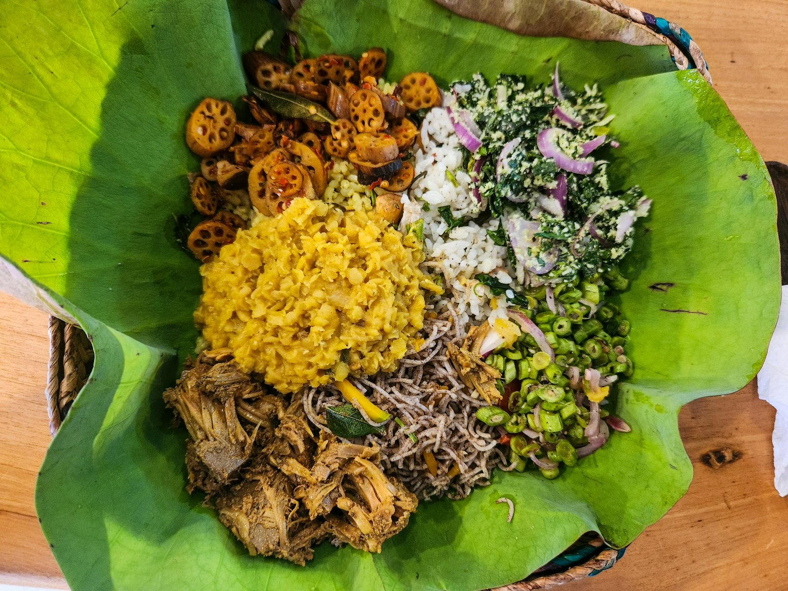 Sri Lankan vegan meal served on a banana leaf with vegetable curries