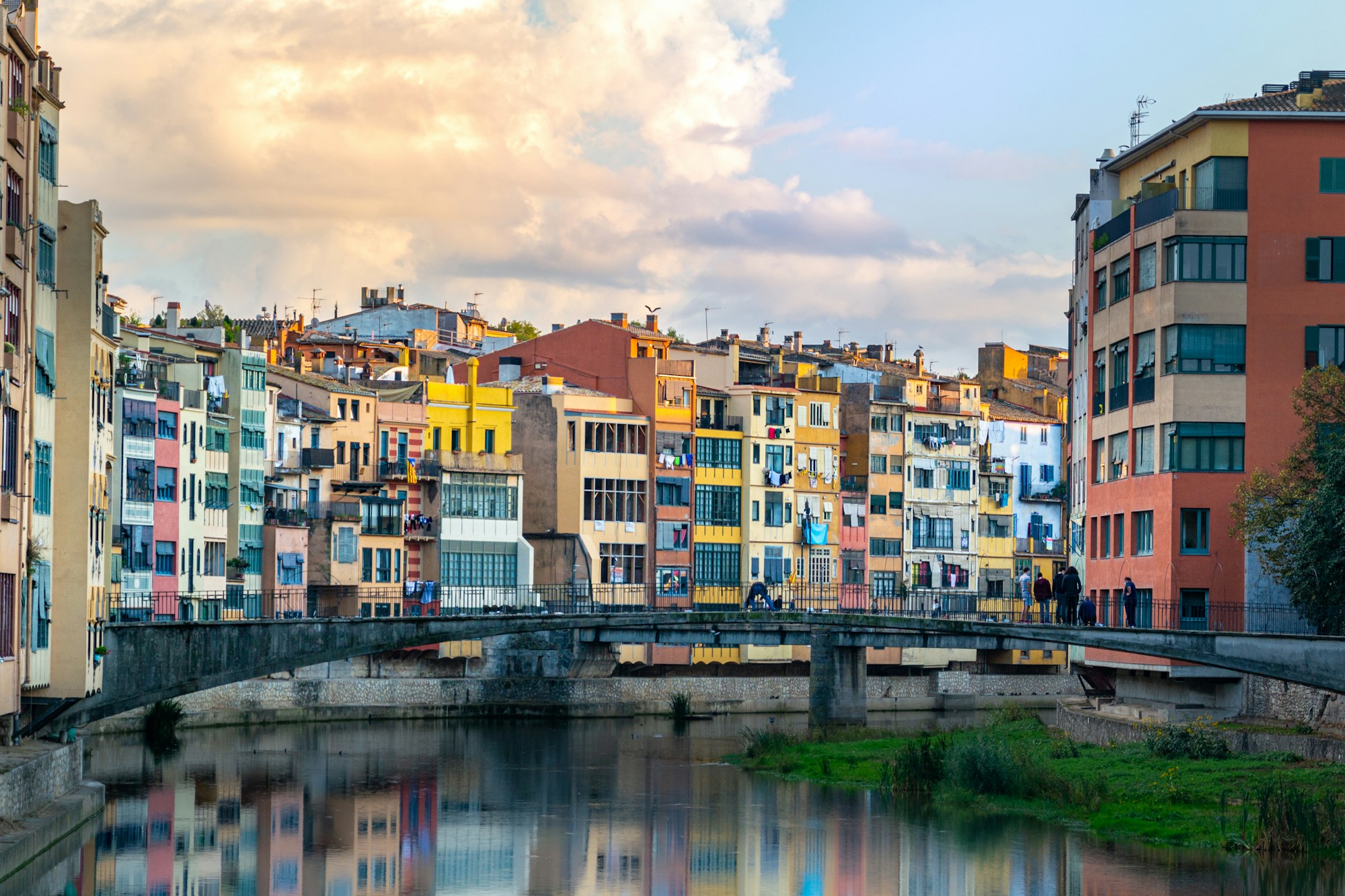 The Onyar river flowing through the old city of Girona with its colourful houses, Catalonia