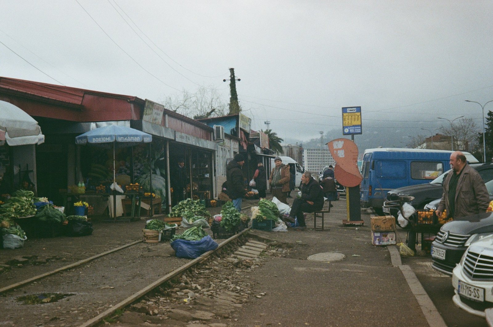 Street market in Tbilisi, Georgia, with stalls of fresh vegetables