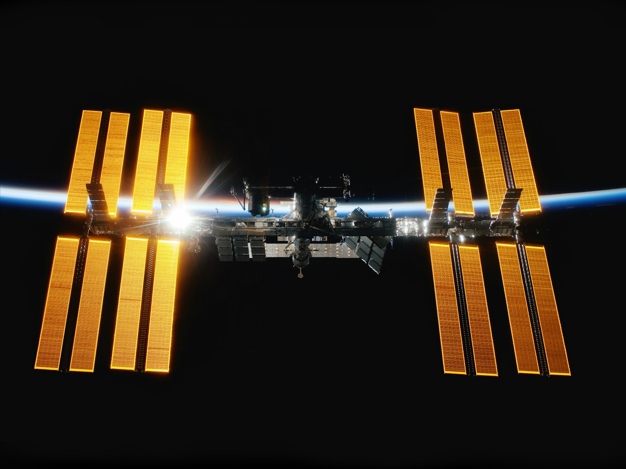 The International Space Station (ISS) in orbit above Earth — the model Vast Space's Haven-1 aims to succeed as the first private commercial station