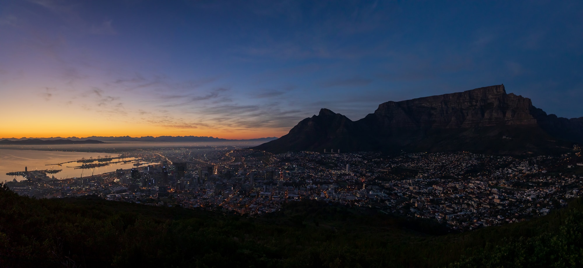 Panoramic view of Cape Town at dawn from Signal Hill, with Table Mountain and the bay in the early morning, South Africa