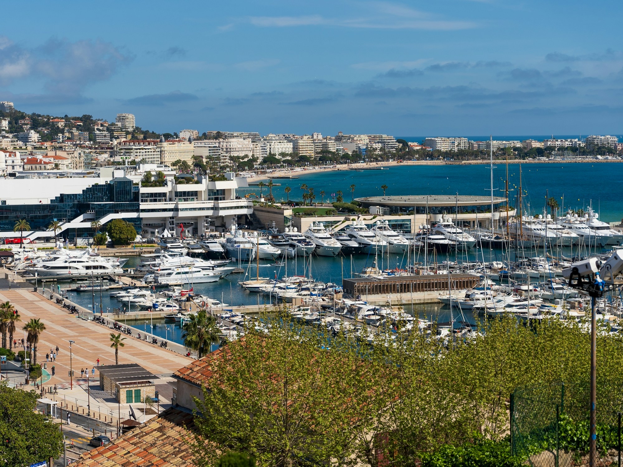 Cannes harbour and its boats in front of the Croisette and the Palais des Festivals