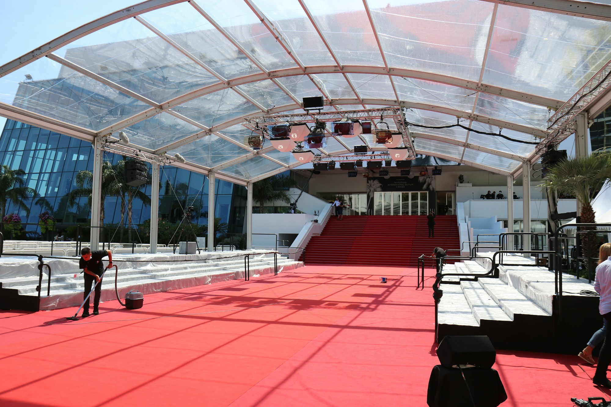 The red carpet of the Cannes Film Festival being set up for a premiere at the Palais des Festivals