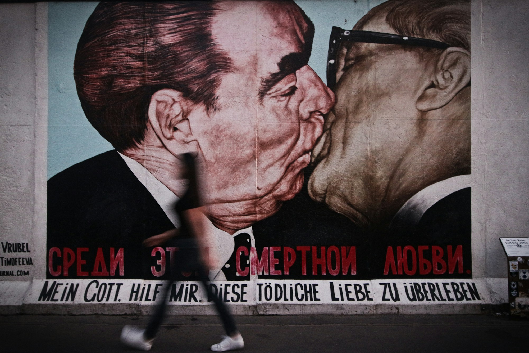 The iconic Bruderkuss mural at the East Side Gallery in Berlin