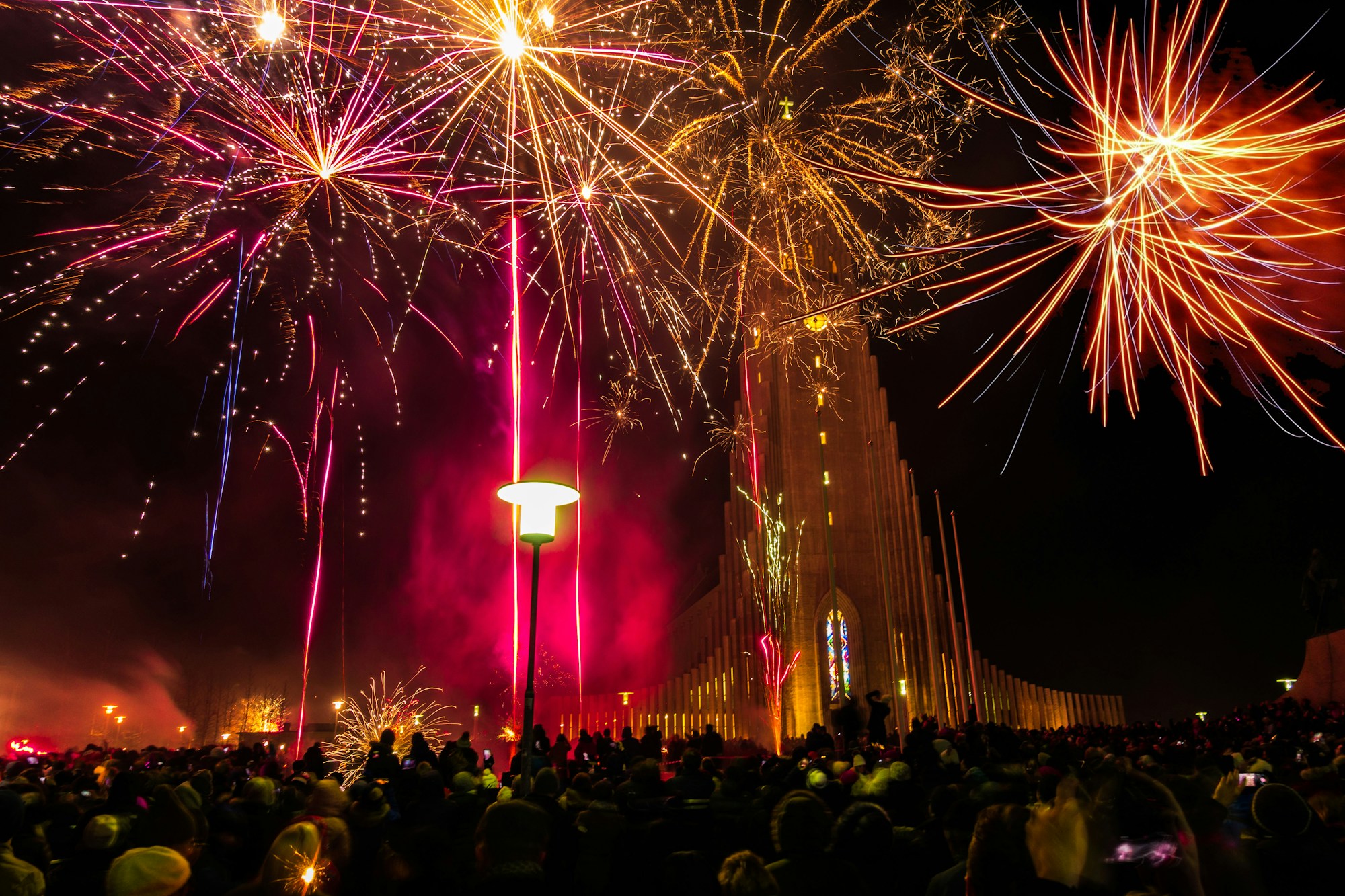 New Year's Eve fireworks in Reykjavik, Iceland — panoramic view over the illuminated city