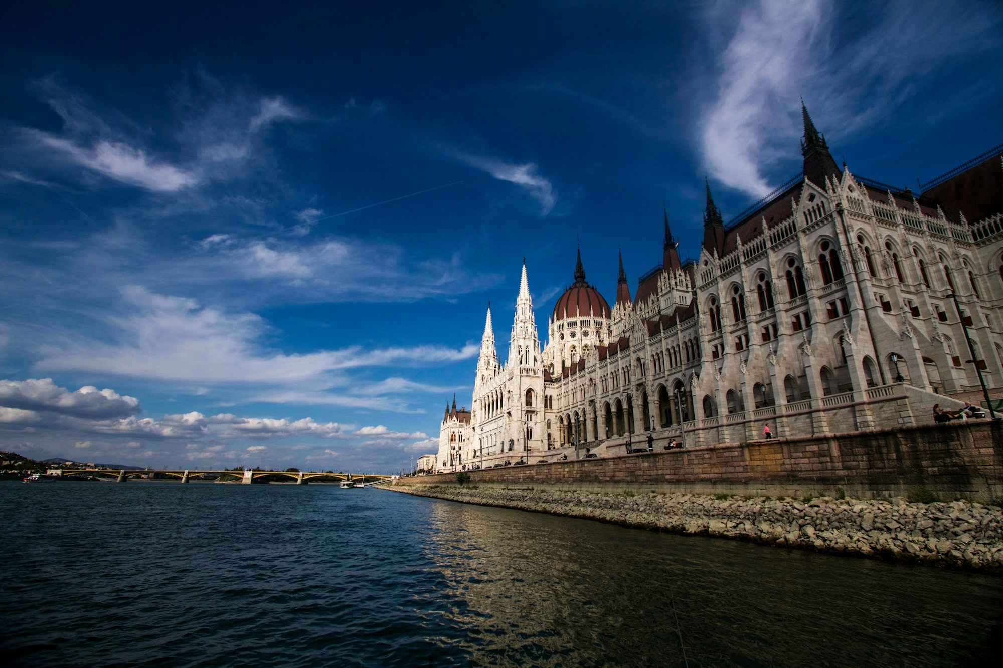 The Hungarian Parliament illuminated along the Danube in Budapest, near the luxury hotels of District V