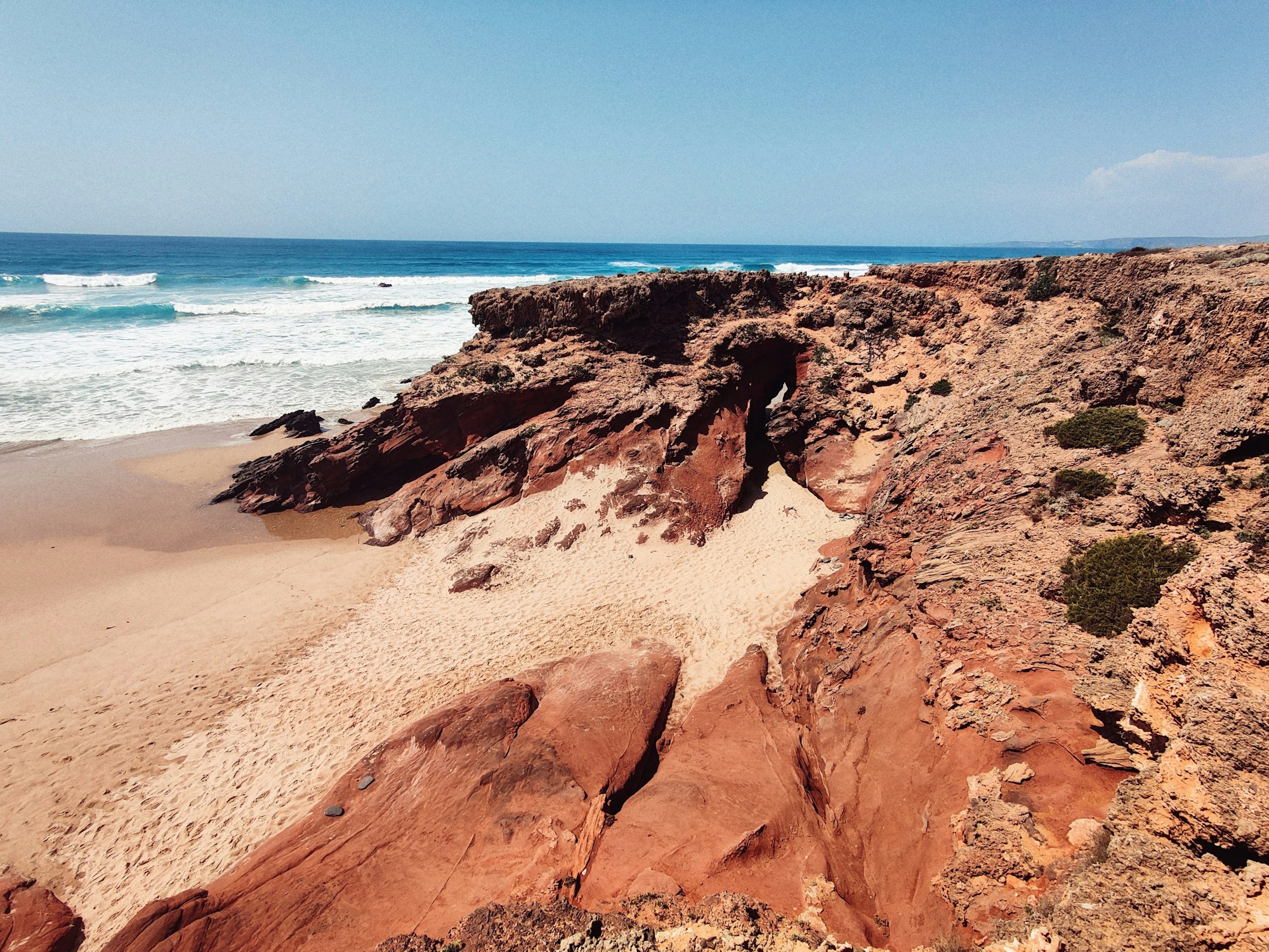 Spectacular limestone cliffs of the Algarve in Portugal overlooking the ocean