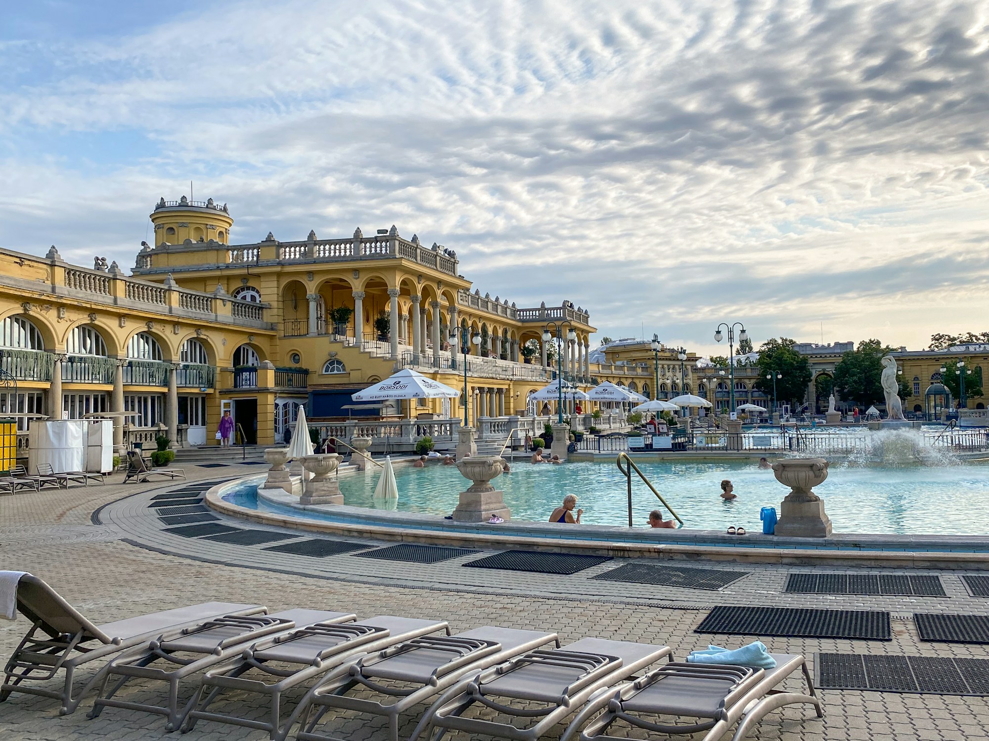 Széchenyi Thermal Baths in Budapest in the early morning with characteristic steam