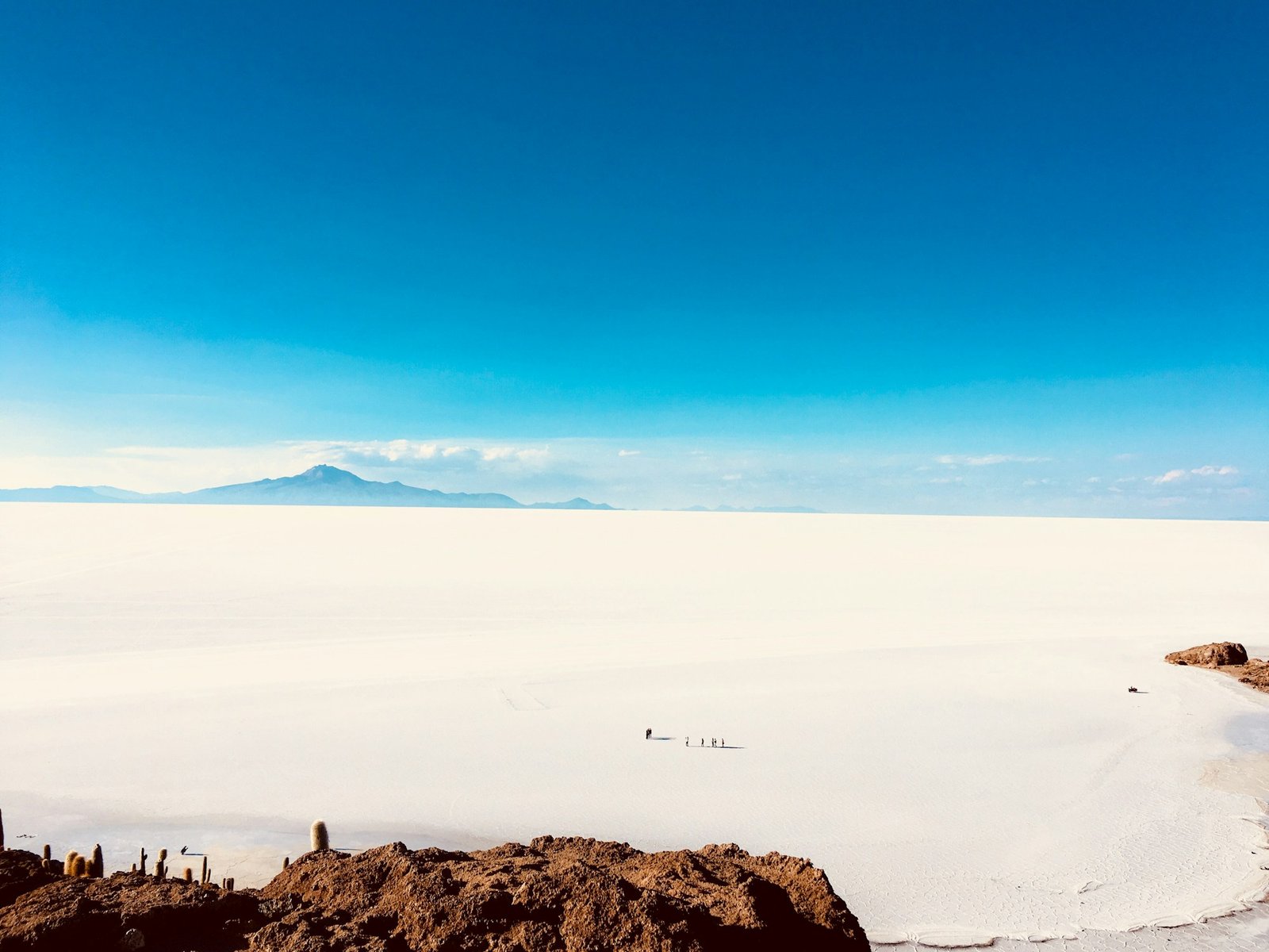 Bolivia's Uyuni salt flat with sky reflected on the water surface