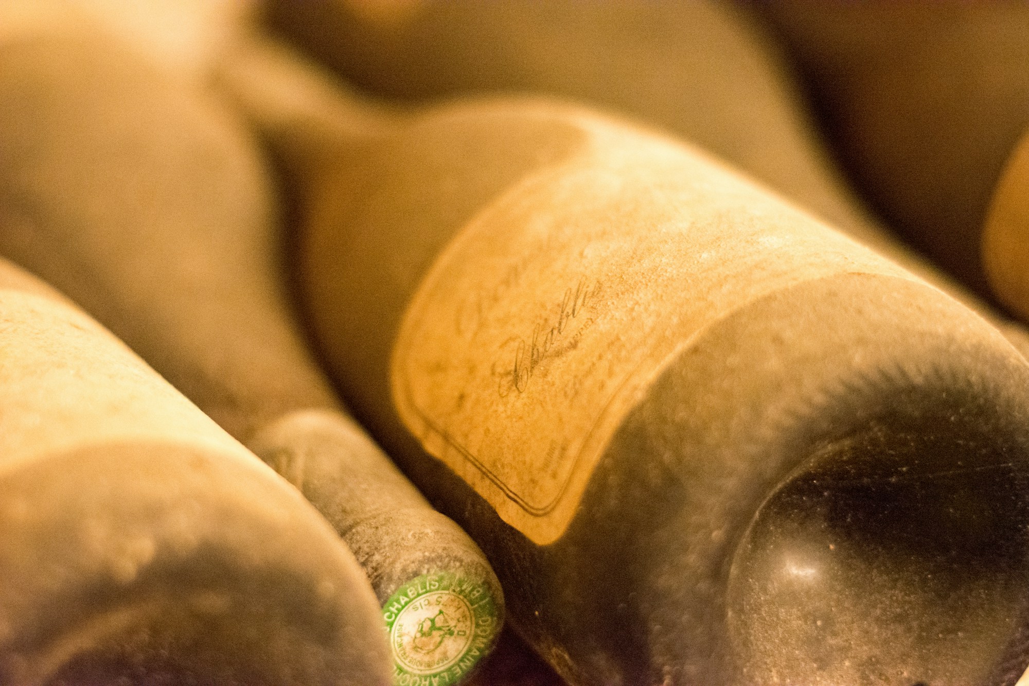 Champagne cellar with bottles lined up in the Gallo-Roman chalk pits of Reims