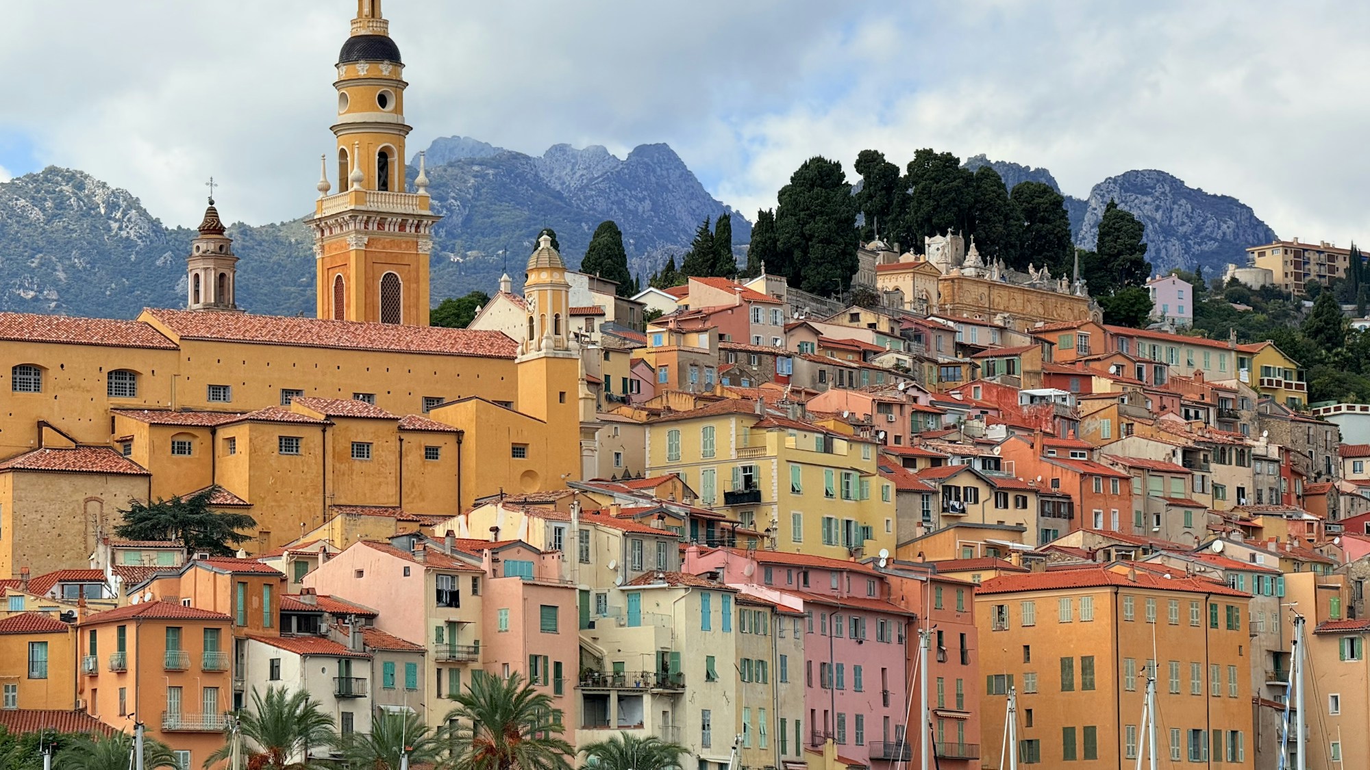 Colourful old town of Menton with its ochre and pink facades, Côte d'Azur, France