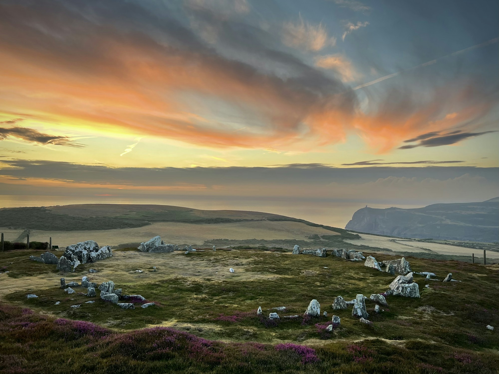 Druidic ceremony at sunrise, white robes and ancestral rituals