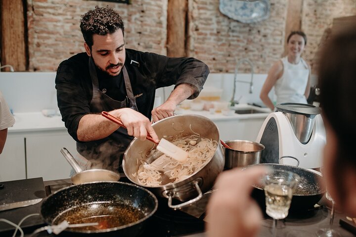 Madrid tapas and paella cooking class with local market visit chef