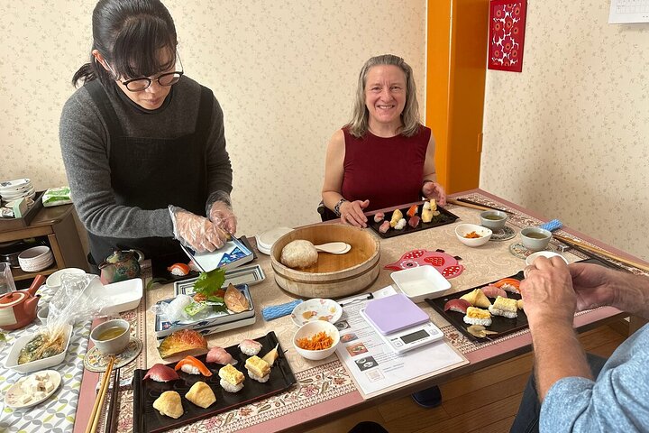 Private sushi cooking class at Emika's home — traditional wooden house Kyoto, matcha tea ceremony