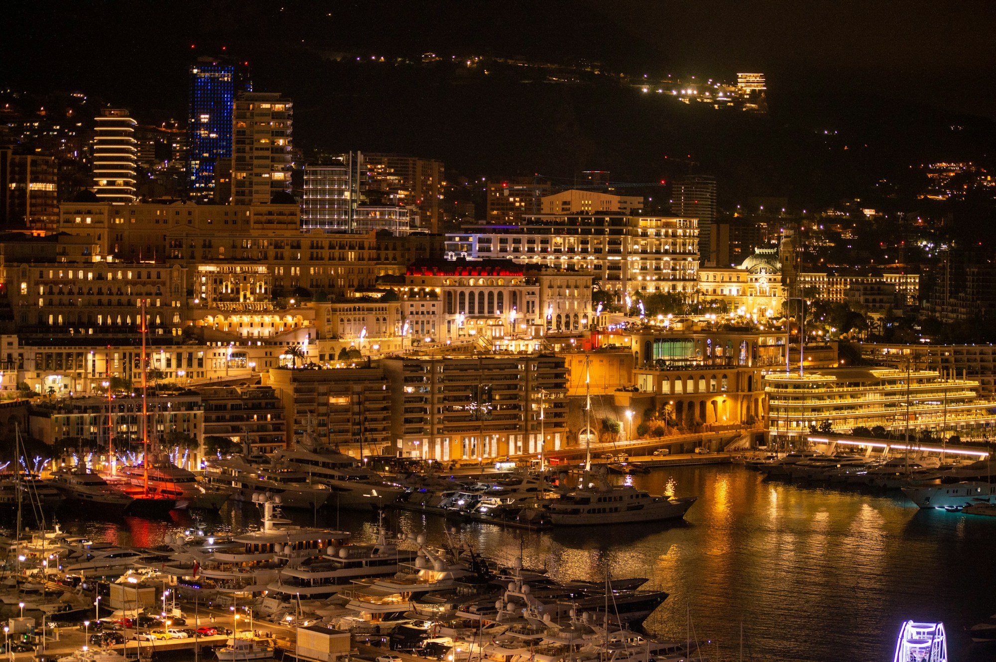 Luxury Monte-Carlo hotels illuminated at night, Monaco