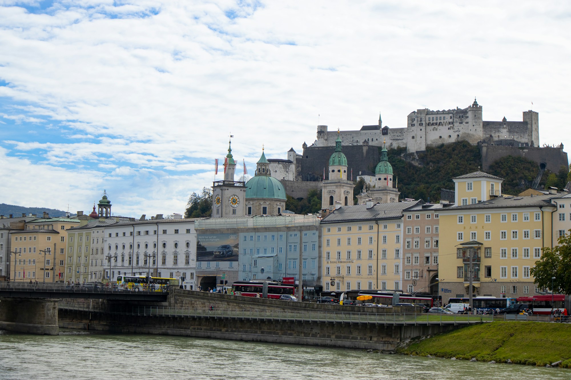 Medieval castle perched on a rock overlooking a town in Slovakia