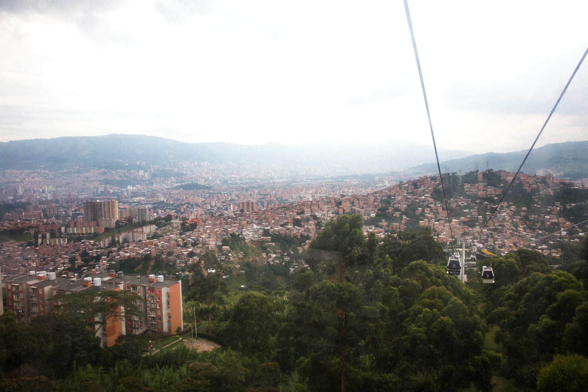 Medellín Metrocable soaring over the city's colourful neighbourhoods, a symbol of urban transformation