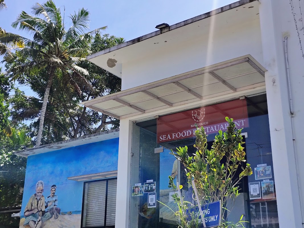 Matsyafed Kerala Seafood Cafe – 9XVP+757, Kazhakootam - Inchivila Bypass, Vizhinjam, Kovalam, Venganoor, Kerala 695521, India (photo 1)